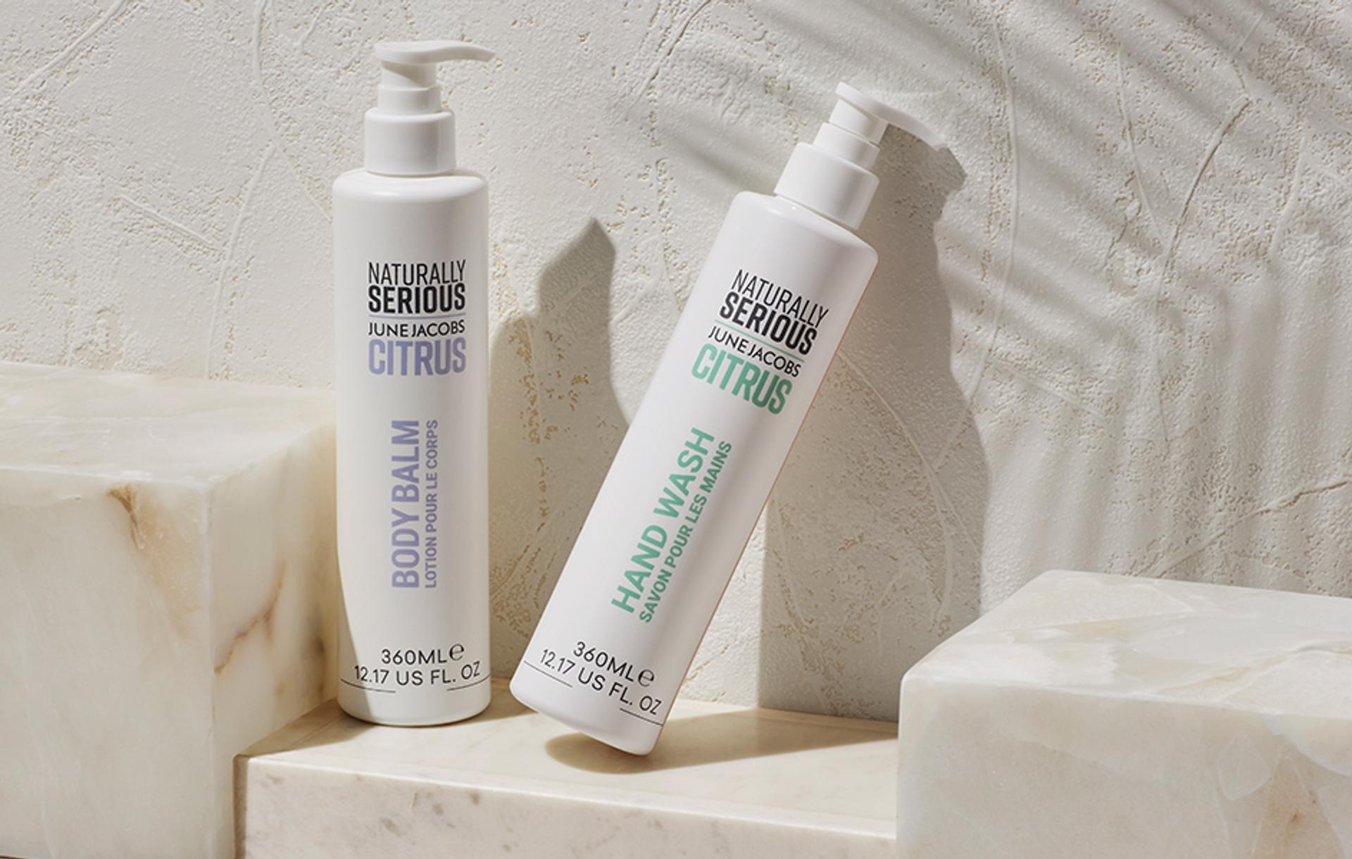 Naturally Serious Skincare Citrus Body Lotion and Hand Wash dispensers on counter