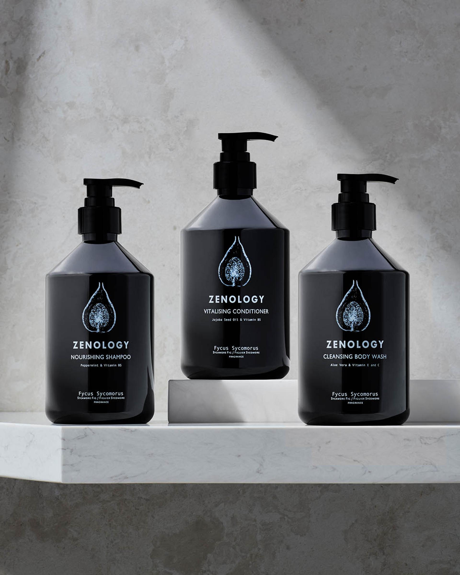 Zenology Sycamore Fig Shampoo, Conditioner, and Body Wash on bathroom shower shelf
