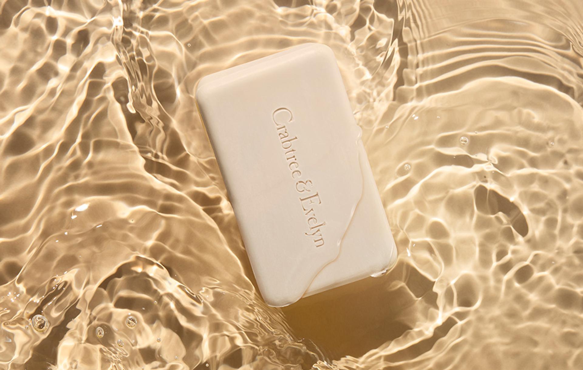 Crabtree & Evelyn bar of soap submerged in water