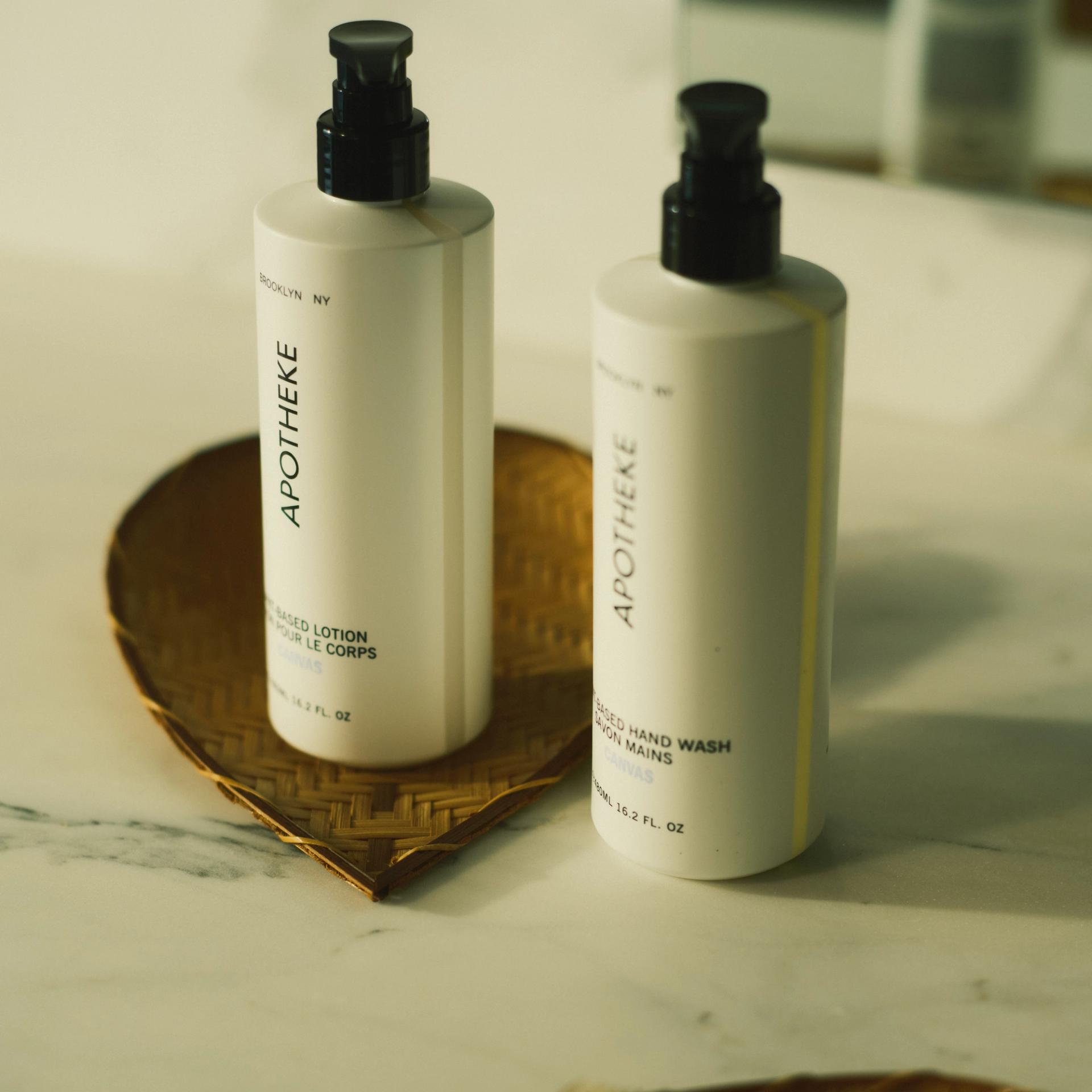 Apotheke Canvas Hand Lotion and Hand Wash on Bathroom Counter