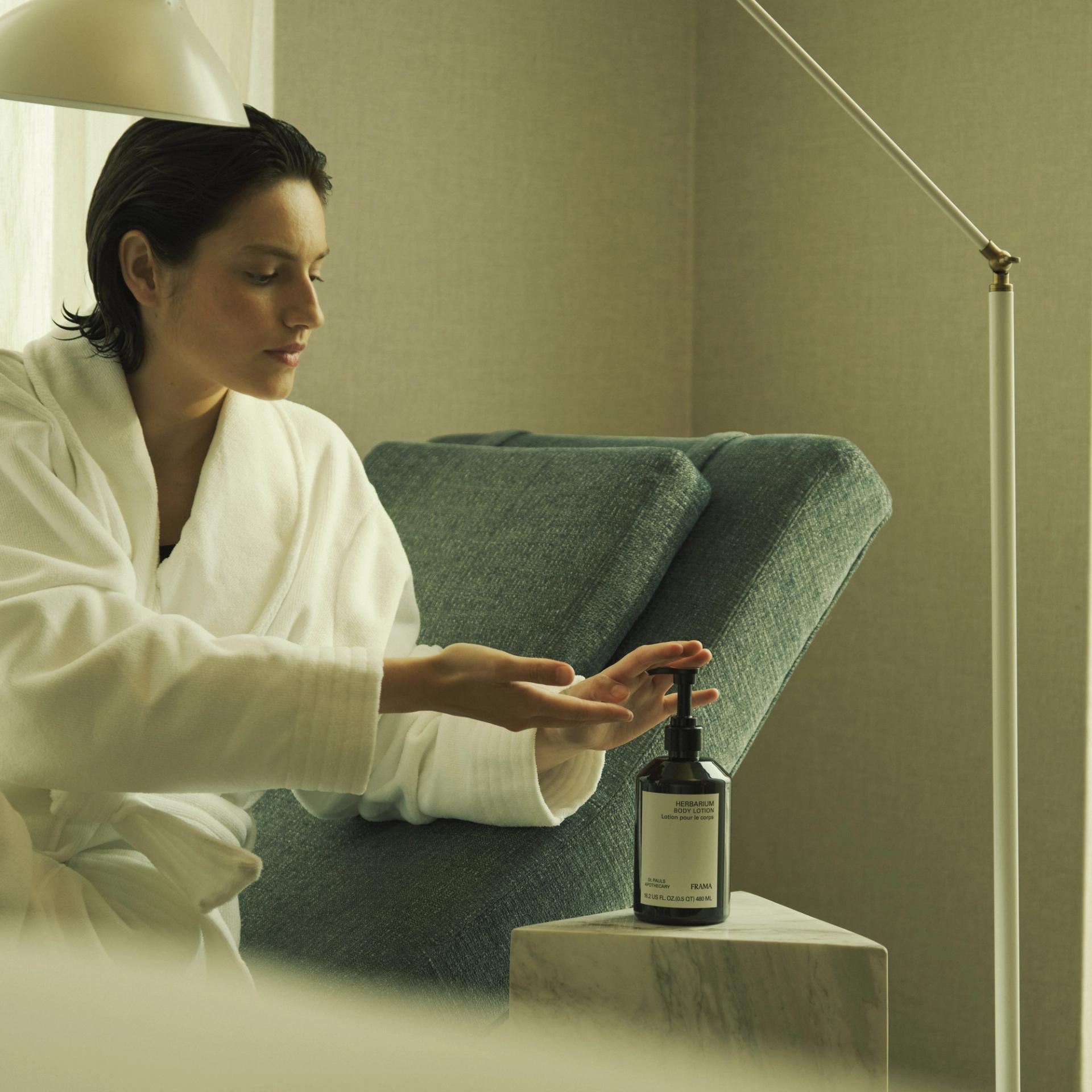 Women applying Frama Herbarium Lotion