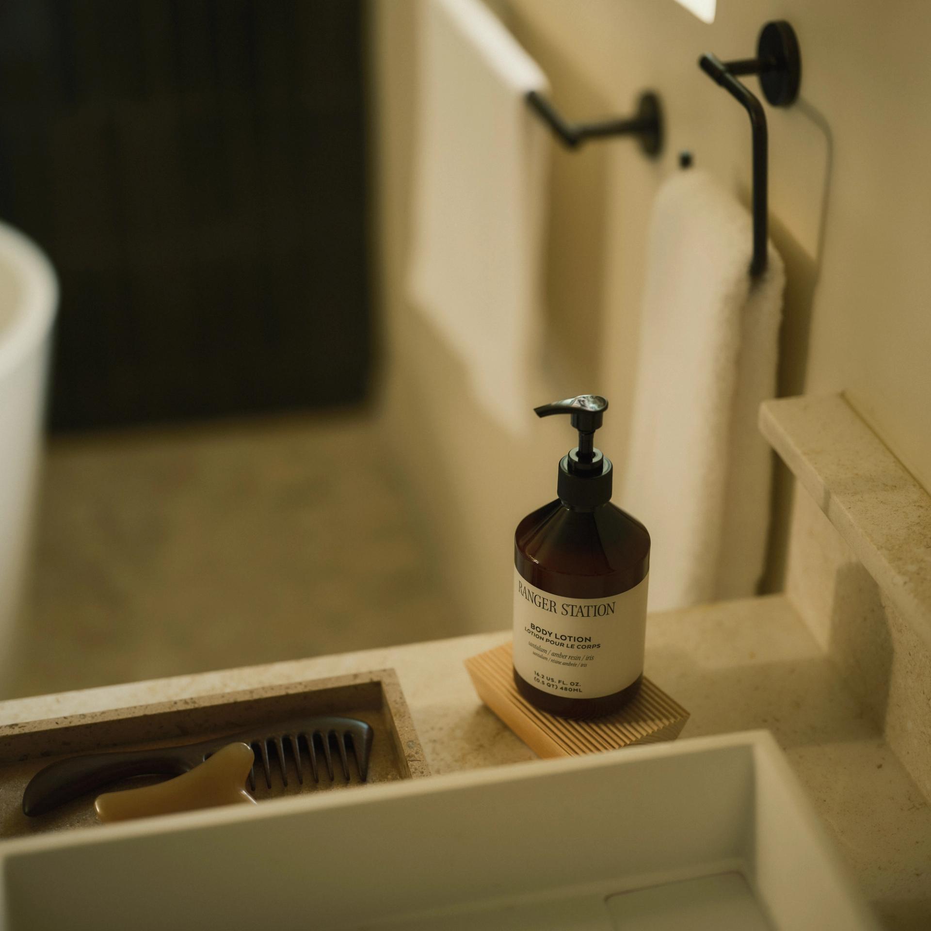Ranger Station Santalum Body Lotion on bathroom vanity counter
