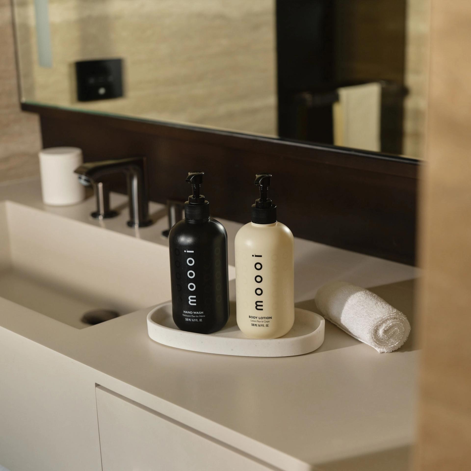 Moooi Hand Wash and Body Lotion on the vanity side.