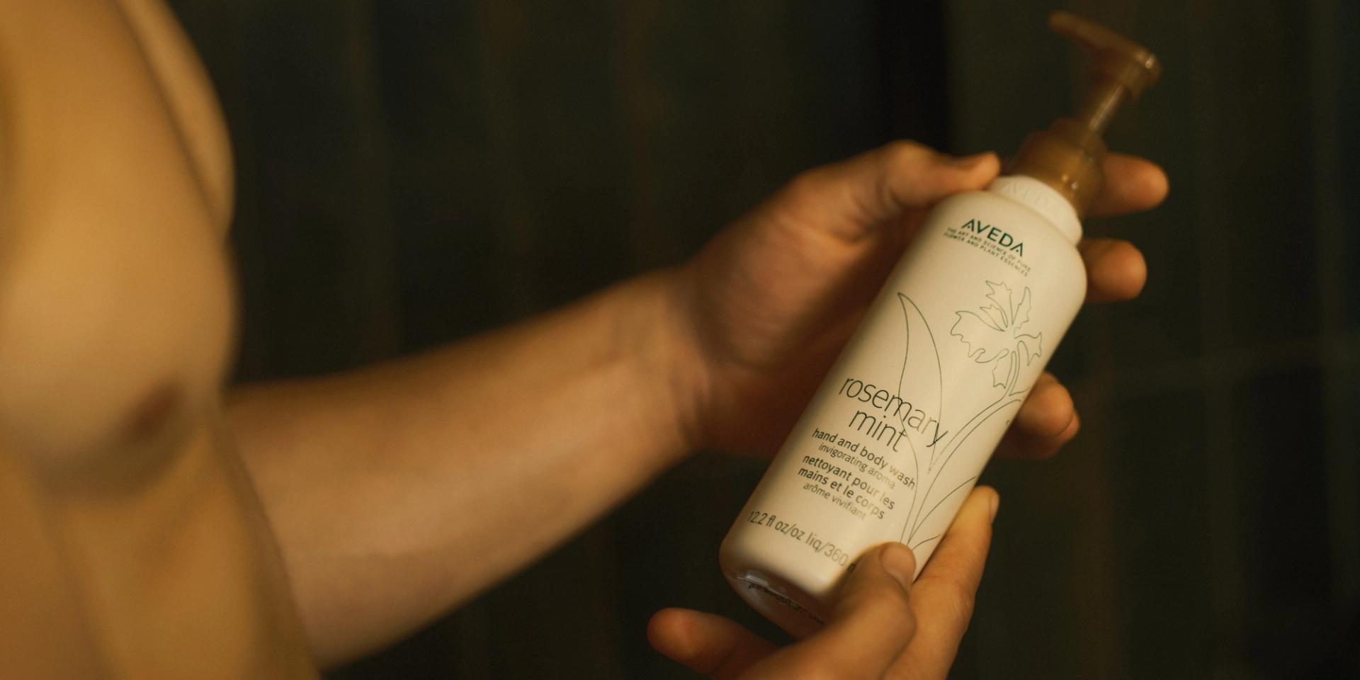 Aveda Rosemary Mint Shampoo in shower with guy