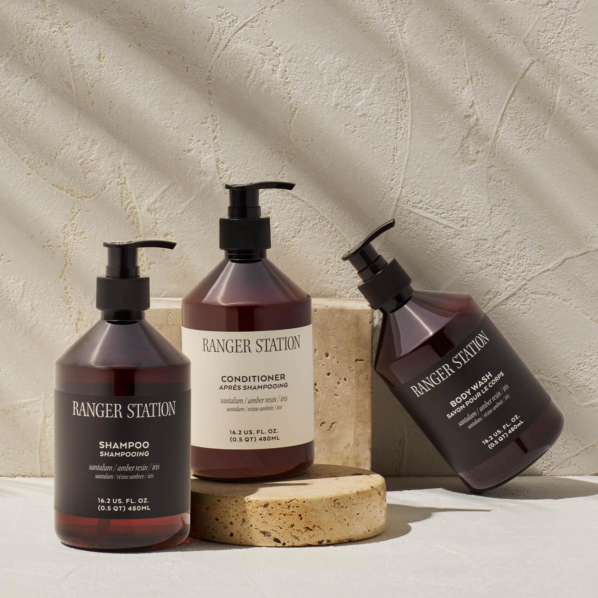 Ranger Station Santalum Shampoo, Conditioner, and Body Wash dispensers