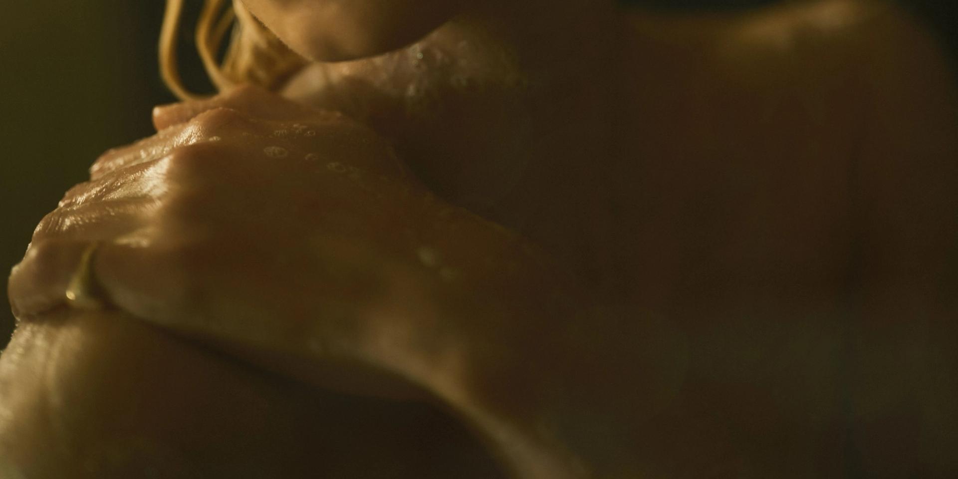 Girl lathering in shower