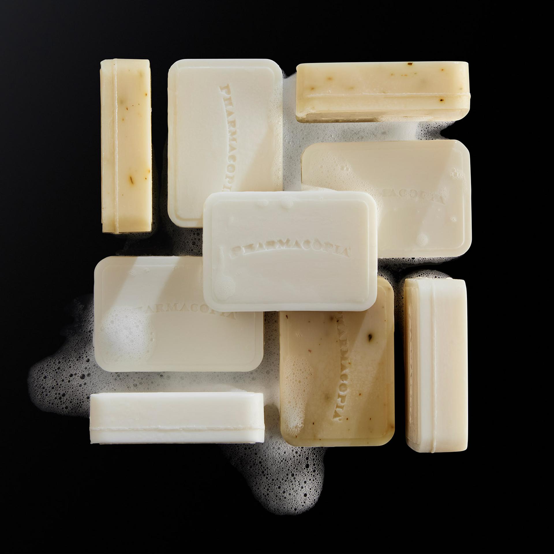 Pharmacopia Bodycare bar soaps on black background