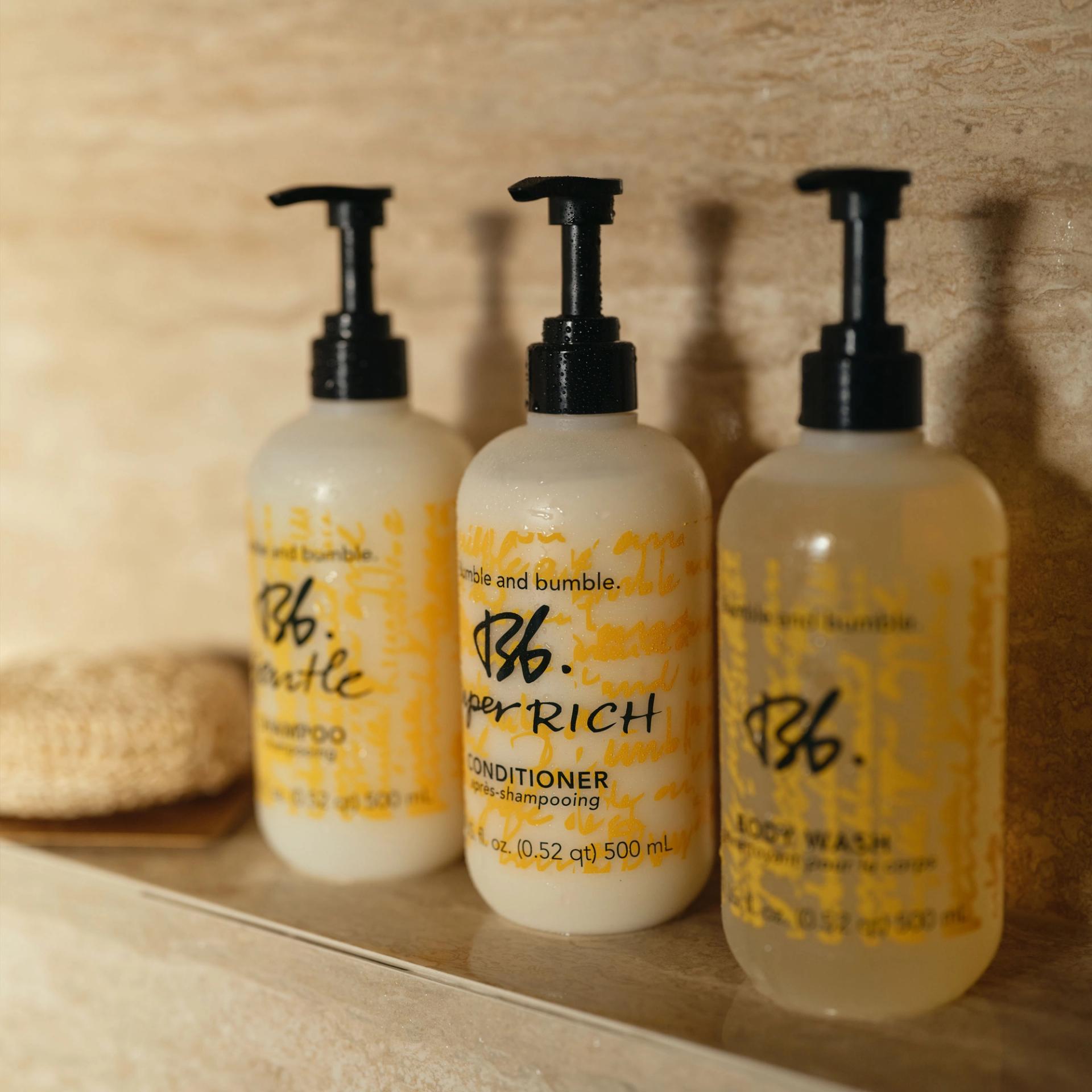 Bumble&bumble Shampoo, Conditioner, Body Wash 500ml in the shower.