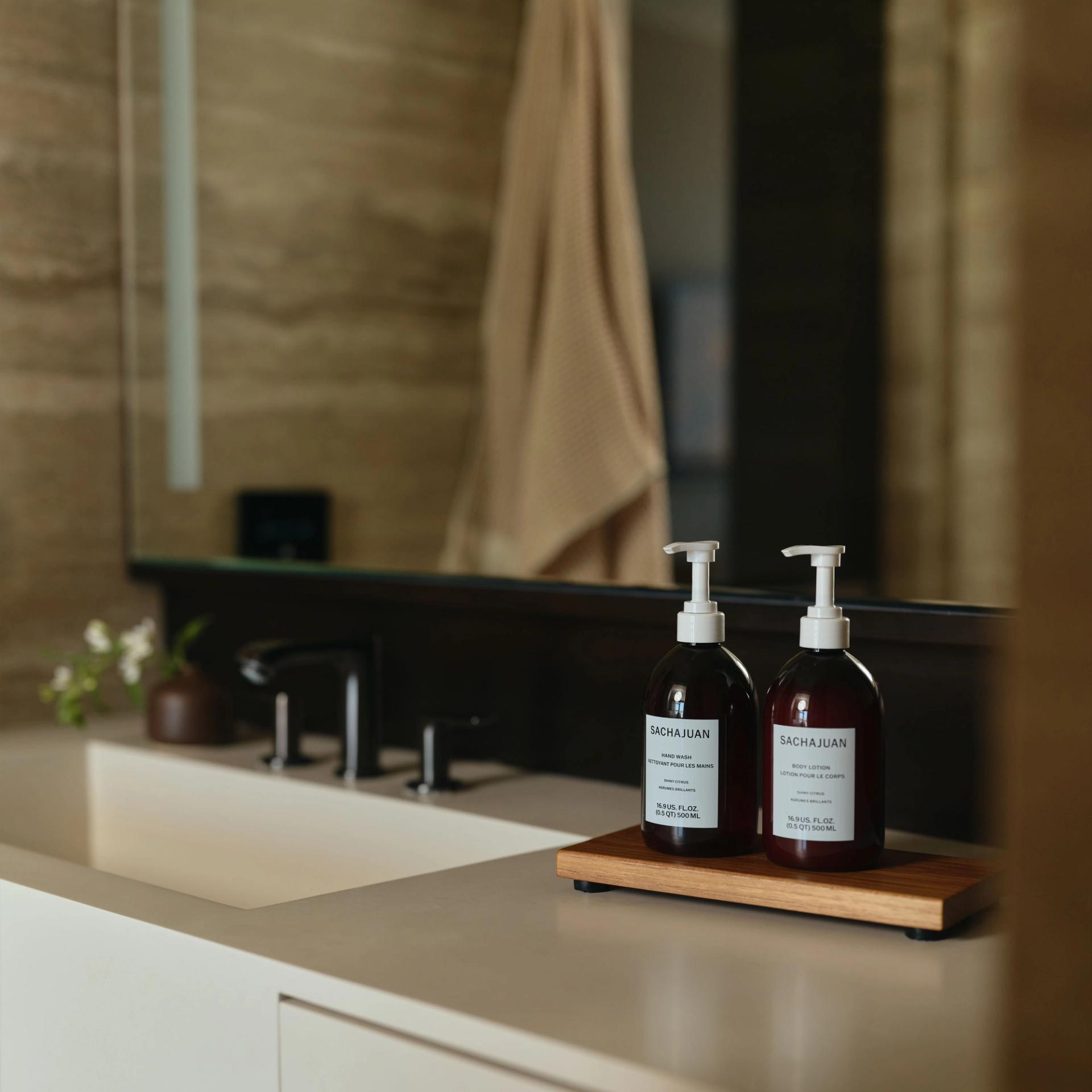 Sachajuan Hand Wash and Body Lotion on the vanity side.