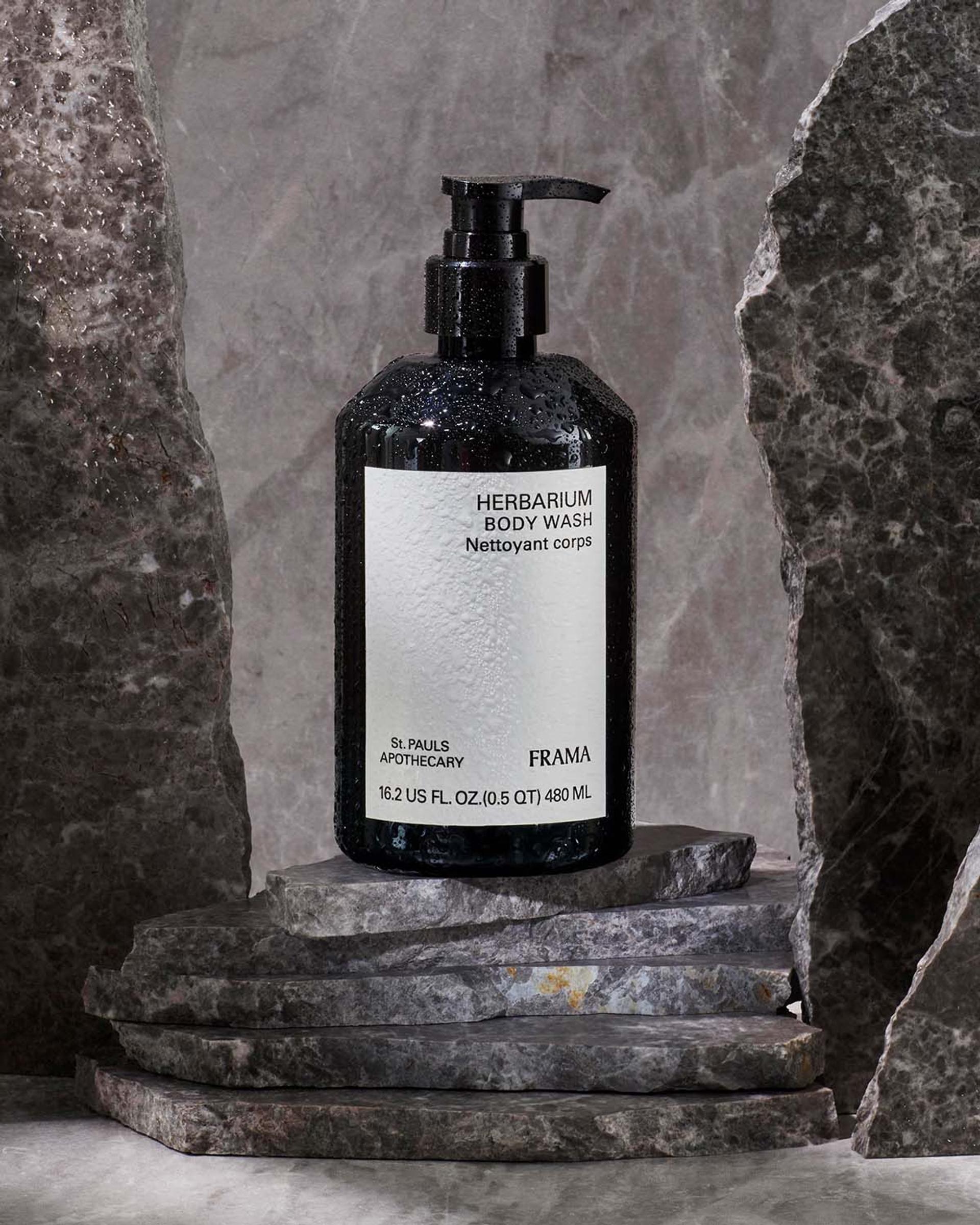 Frama Herbarium Body Wash sitting on rock pedestal