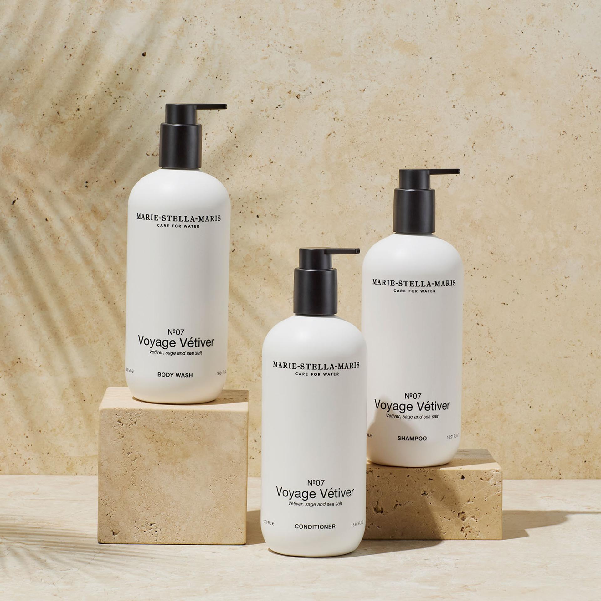 Marie Stella Maris Voyage Vetiver Shampoo, Conditioner and Body Wash dispensers on counter