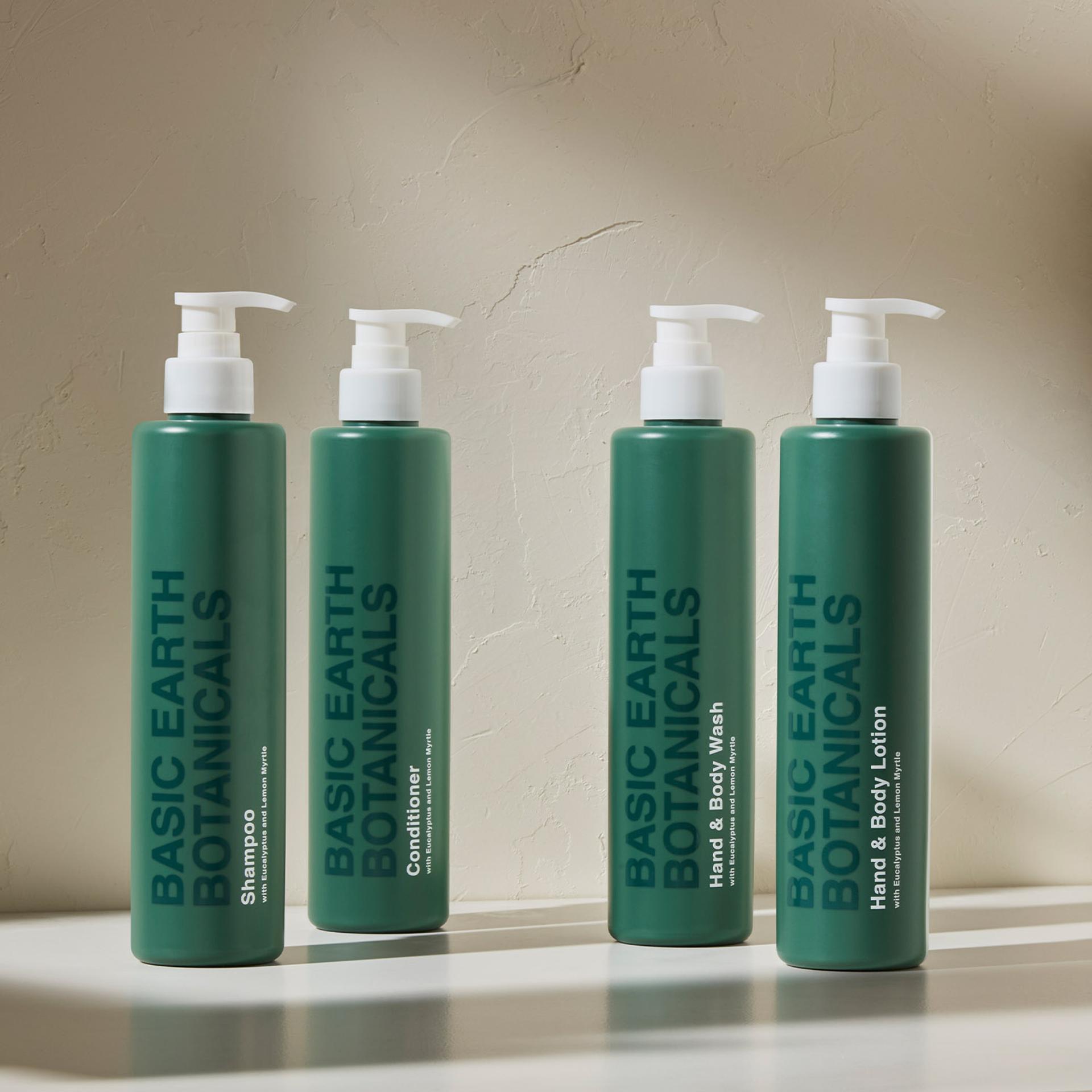 Basic Earth Botanicals Shampoo, Conditioner, Hand & Body Wash and Lotion bottles