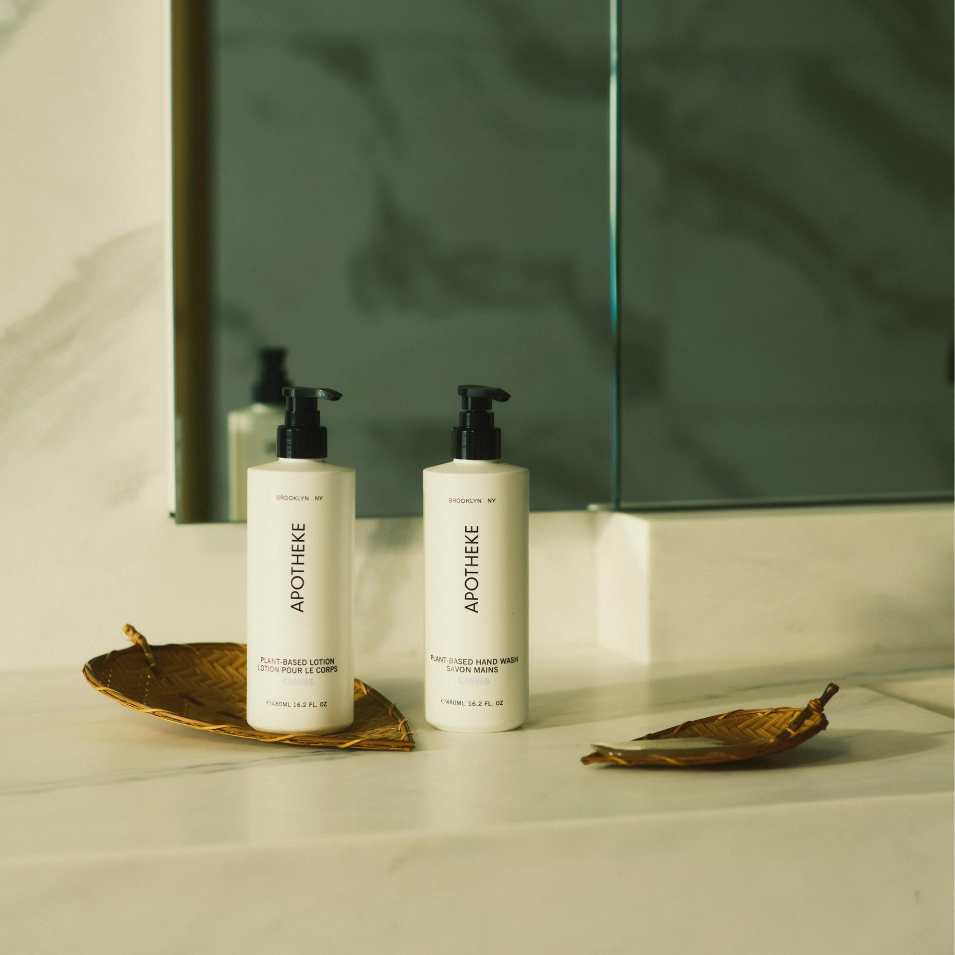 Apotheke Canvas Hand Lotion and Hand Wash on Bathroom Counter