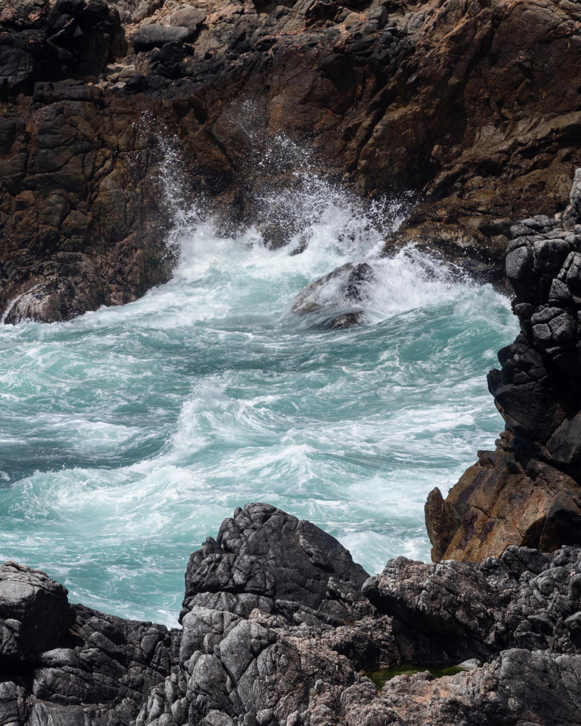 Rocky coastline with crashing waves