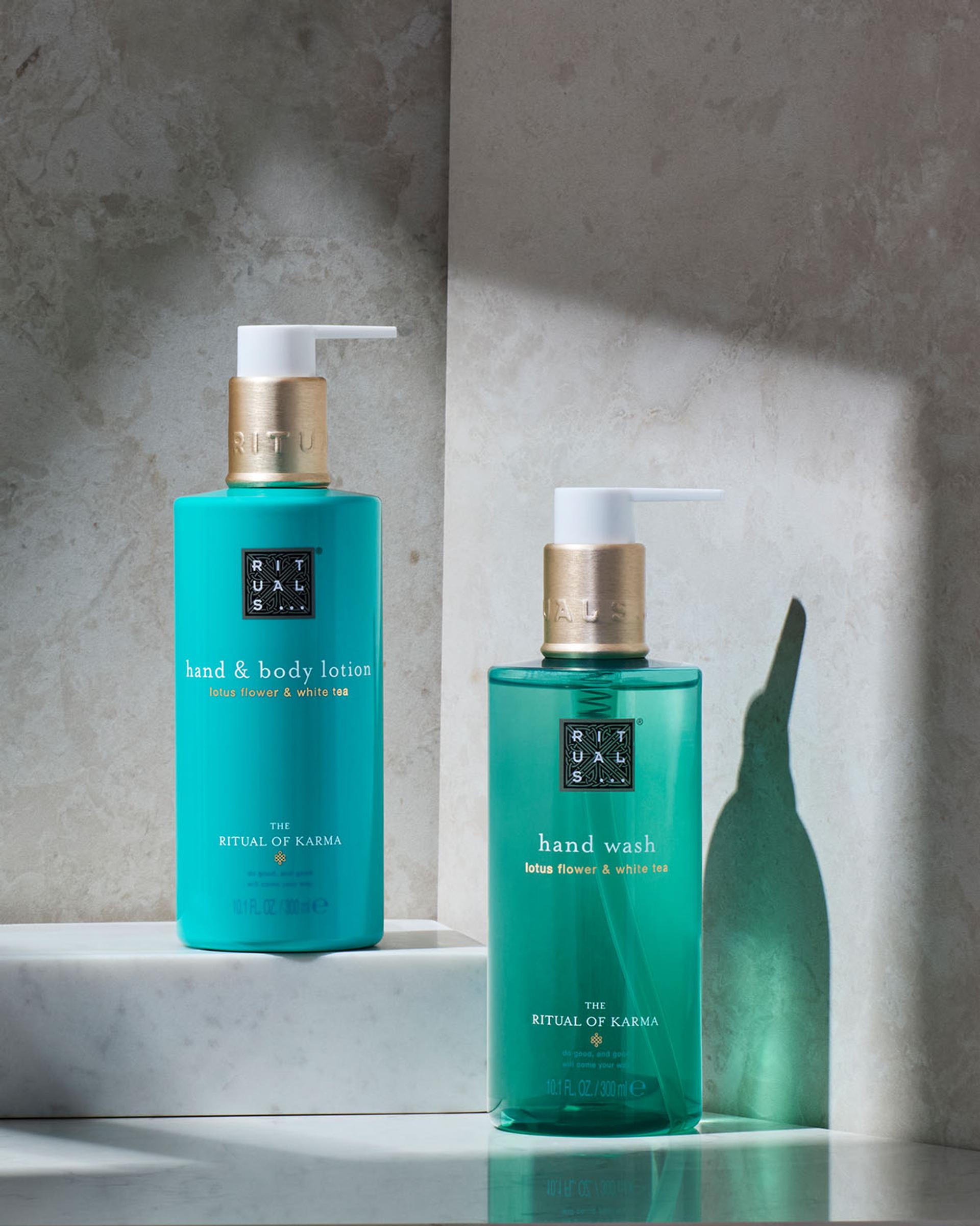 Rituals of Karma Body Lotion and Hand Wash dispensers on marble