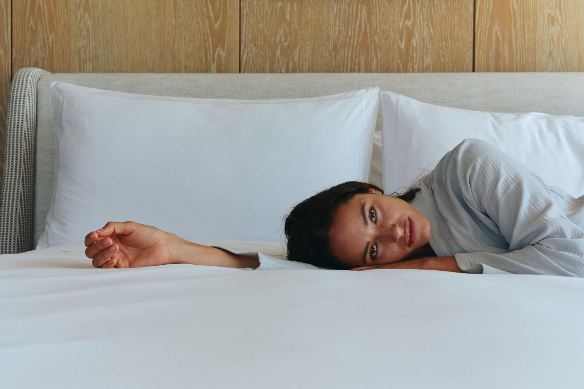 Model on a bed.
