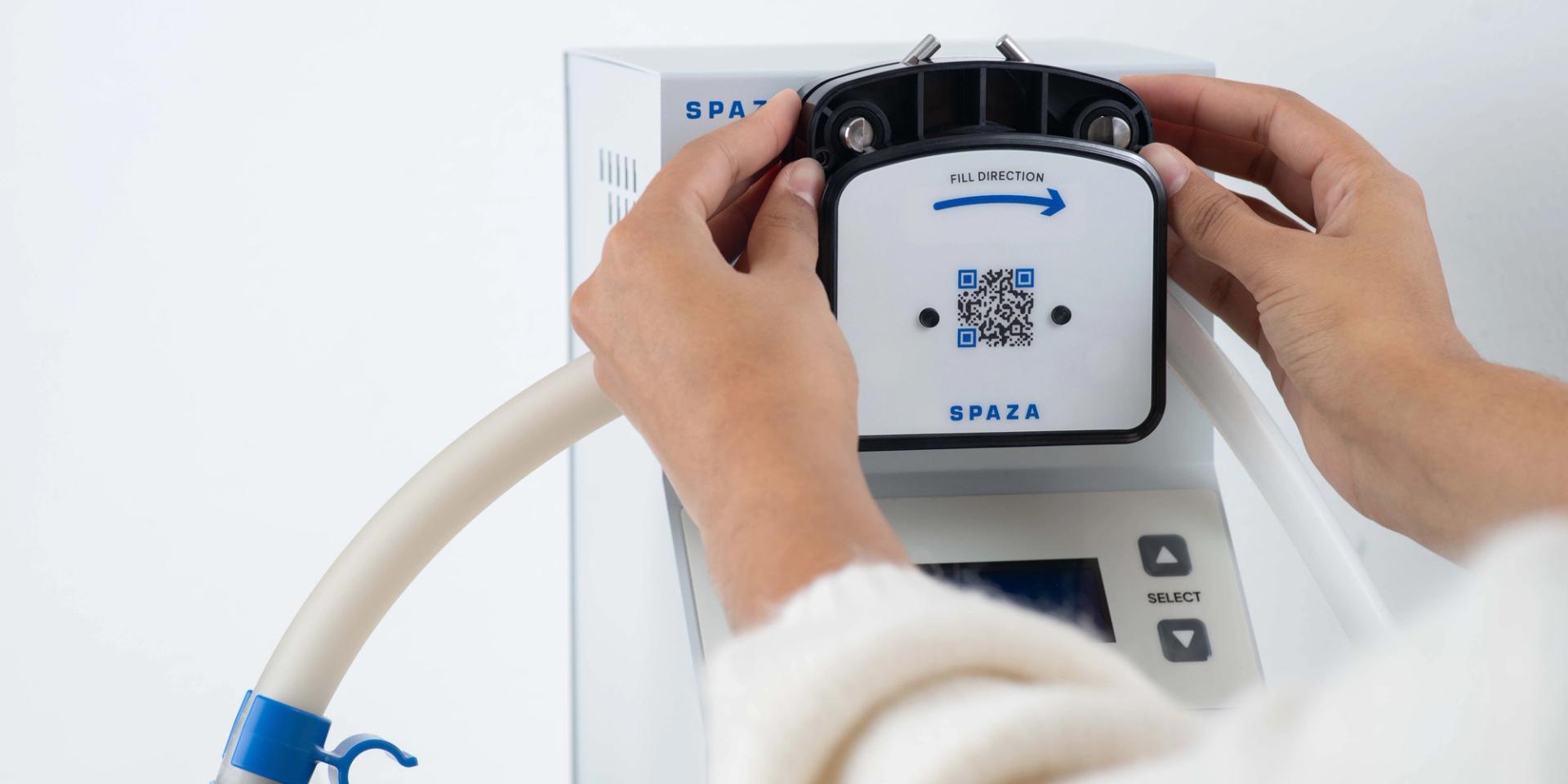 Spaza Refill Machine hands turning pump head