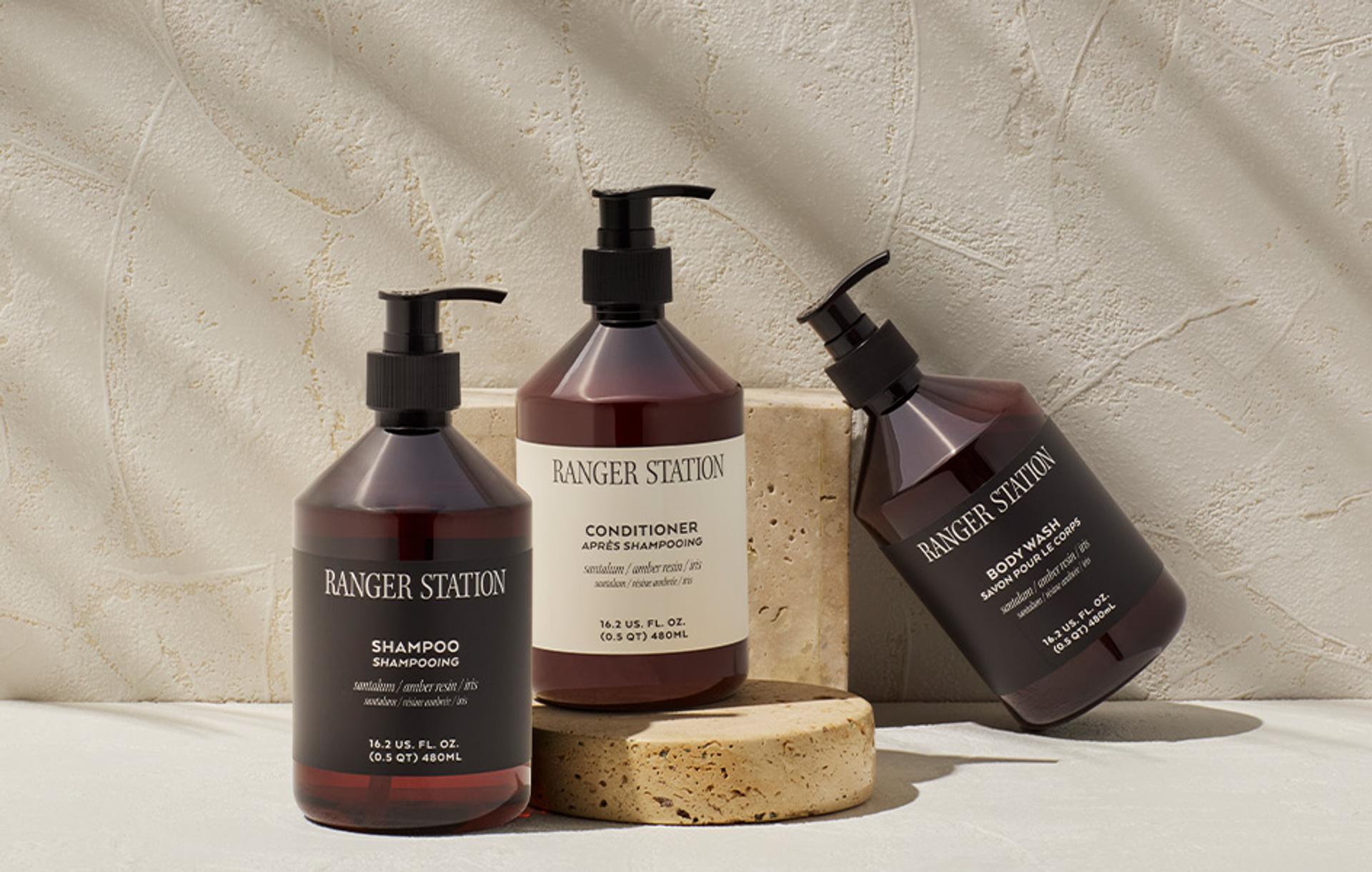 Ranger Station Santalum Shampoo, Conditioner, and Body Wash dispensers
