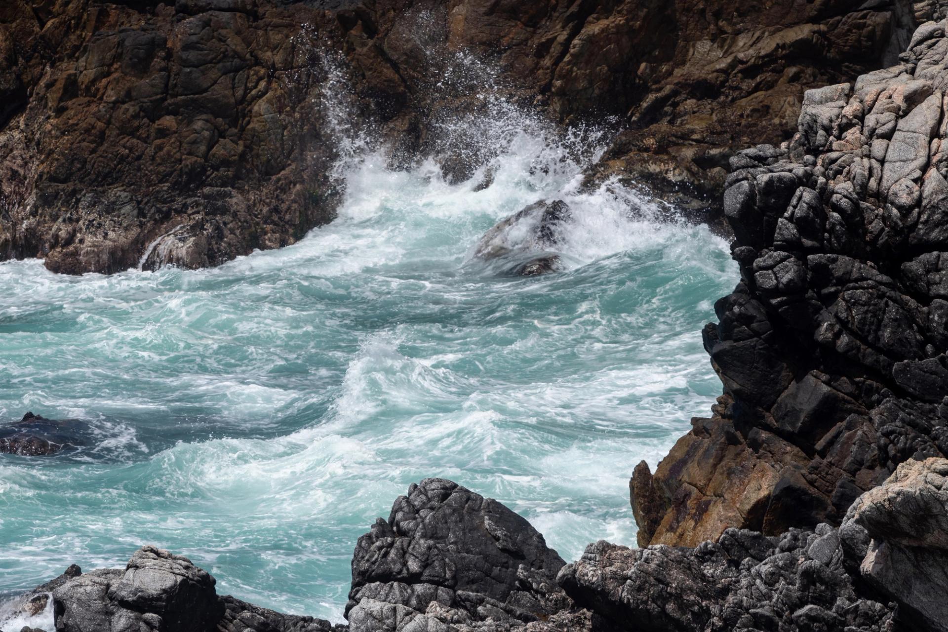 Rocky coastline with crashing waves