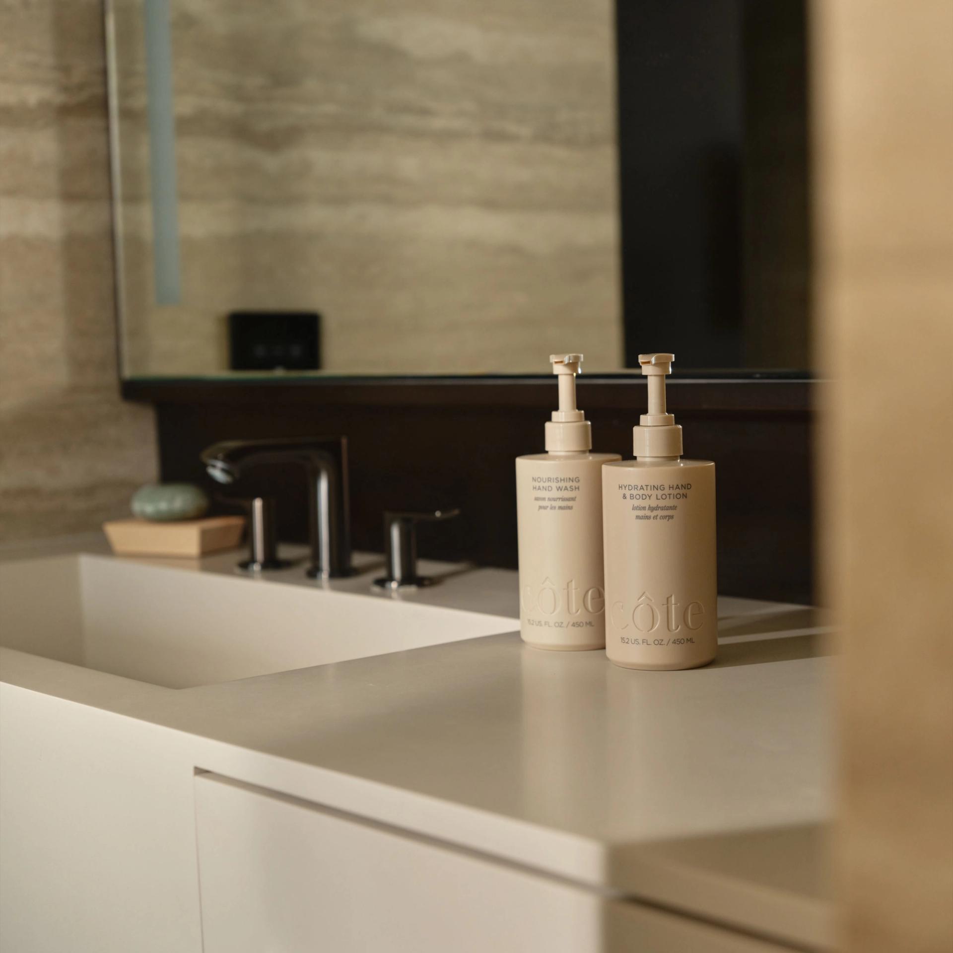 Cote Body Lotion and Hand Wash on the vanity side.