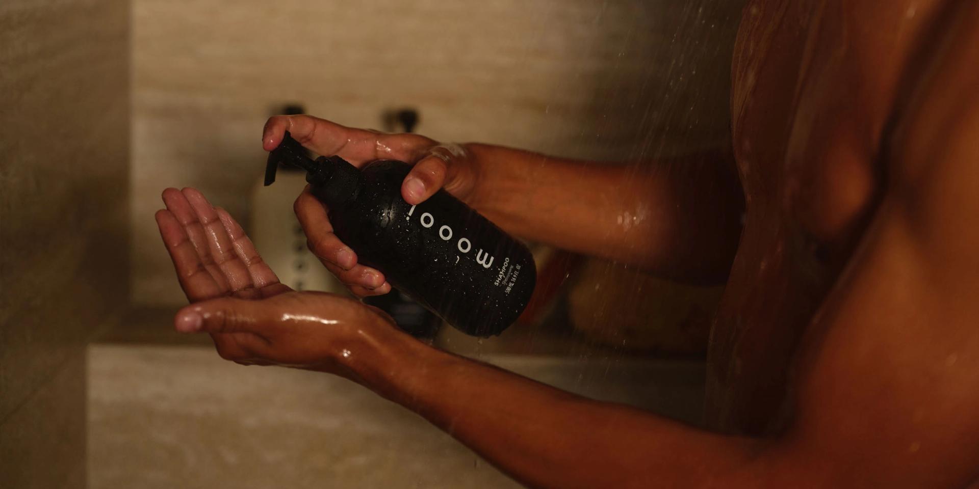 Moooi Shampoo, Conditioner, Body Wash in the shower.