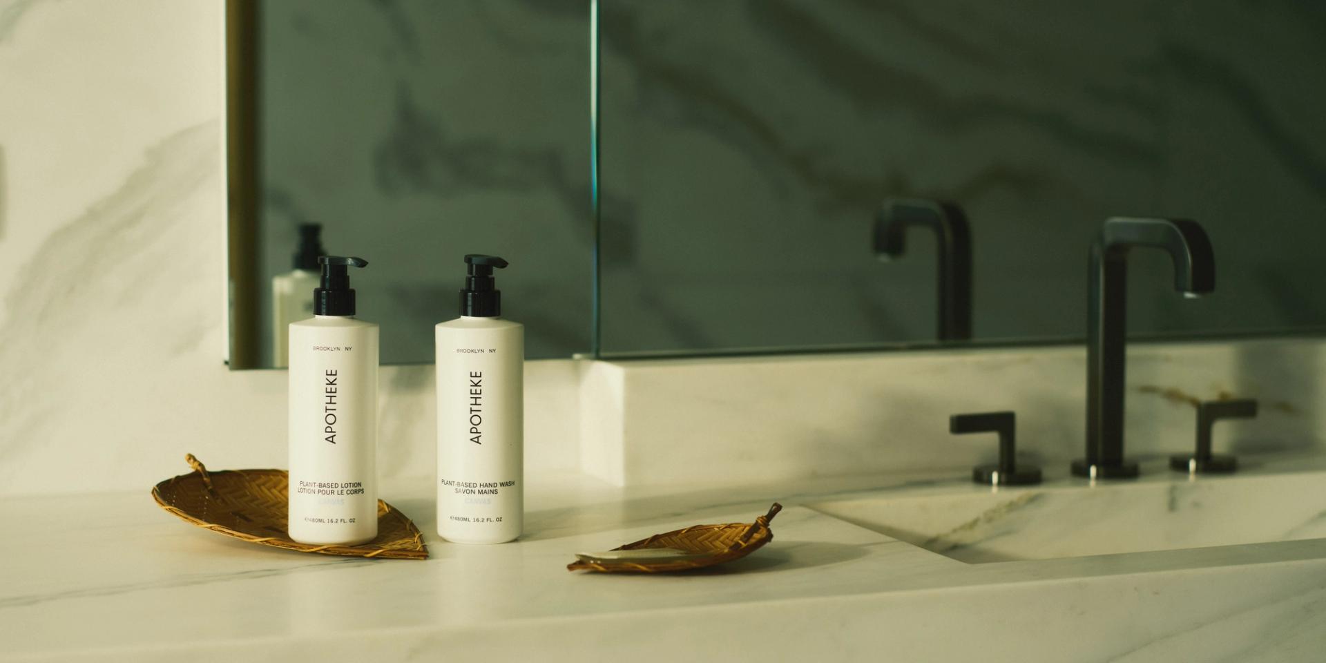 Apotheke Canvas Hand Lotion and Hand Wash on Bathroom Counter