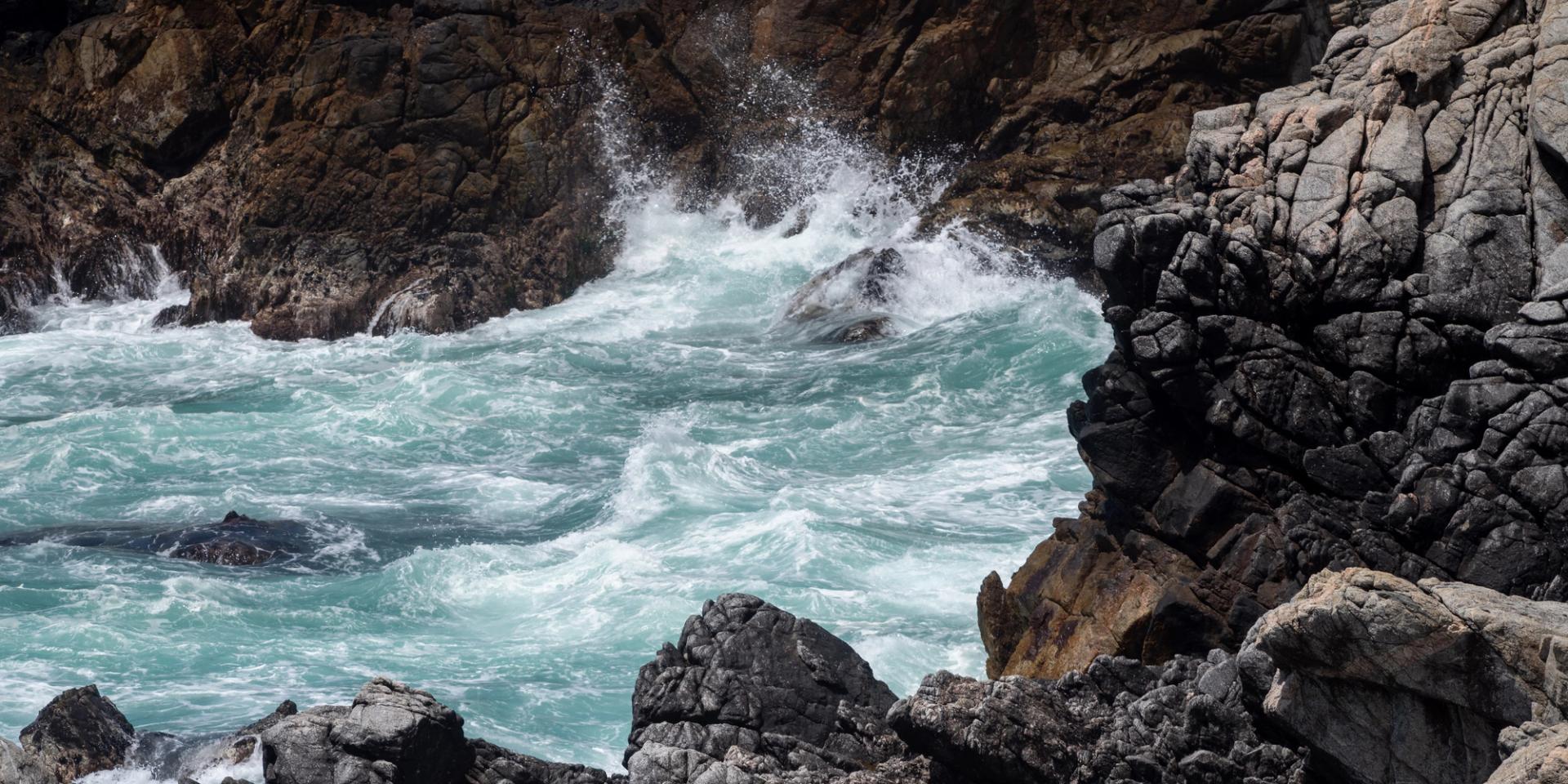 Rocky coastline with crashing waves