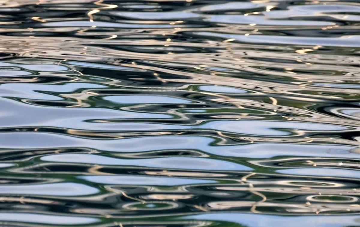 Calm water reflecting like a mirror