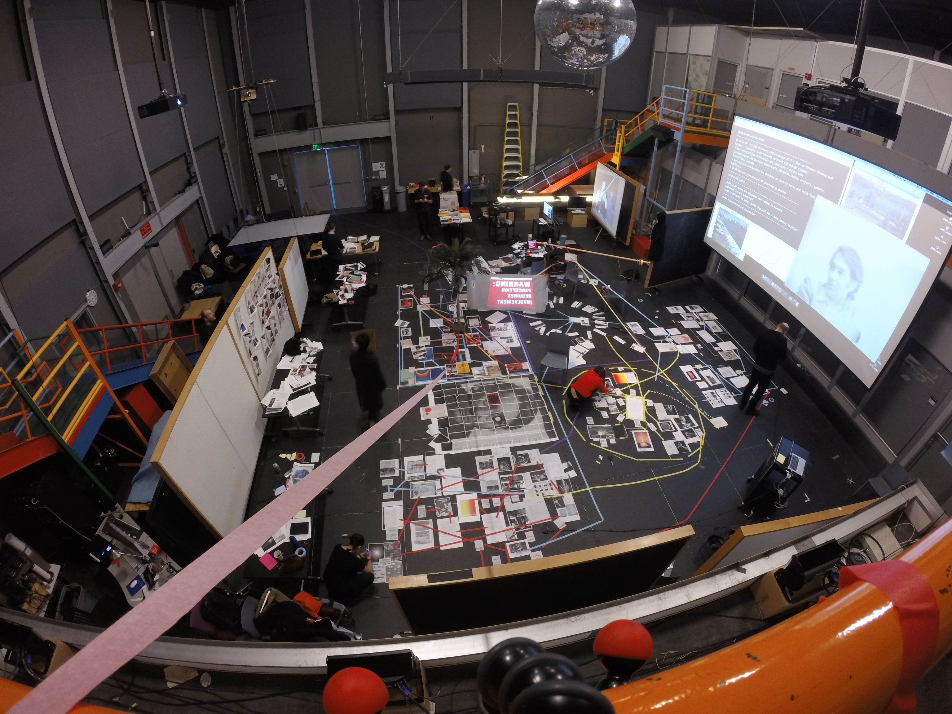 MIT ACT/CAVS Workshop, view of people layout out archive material on the floor