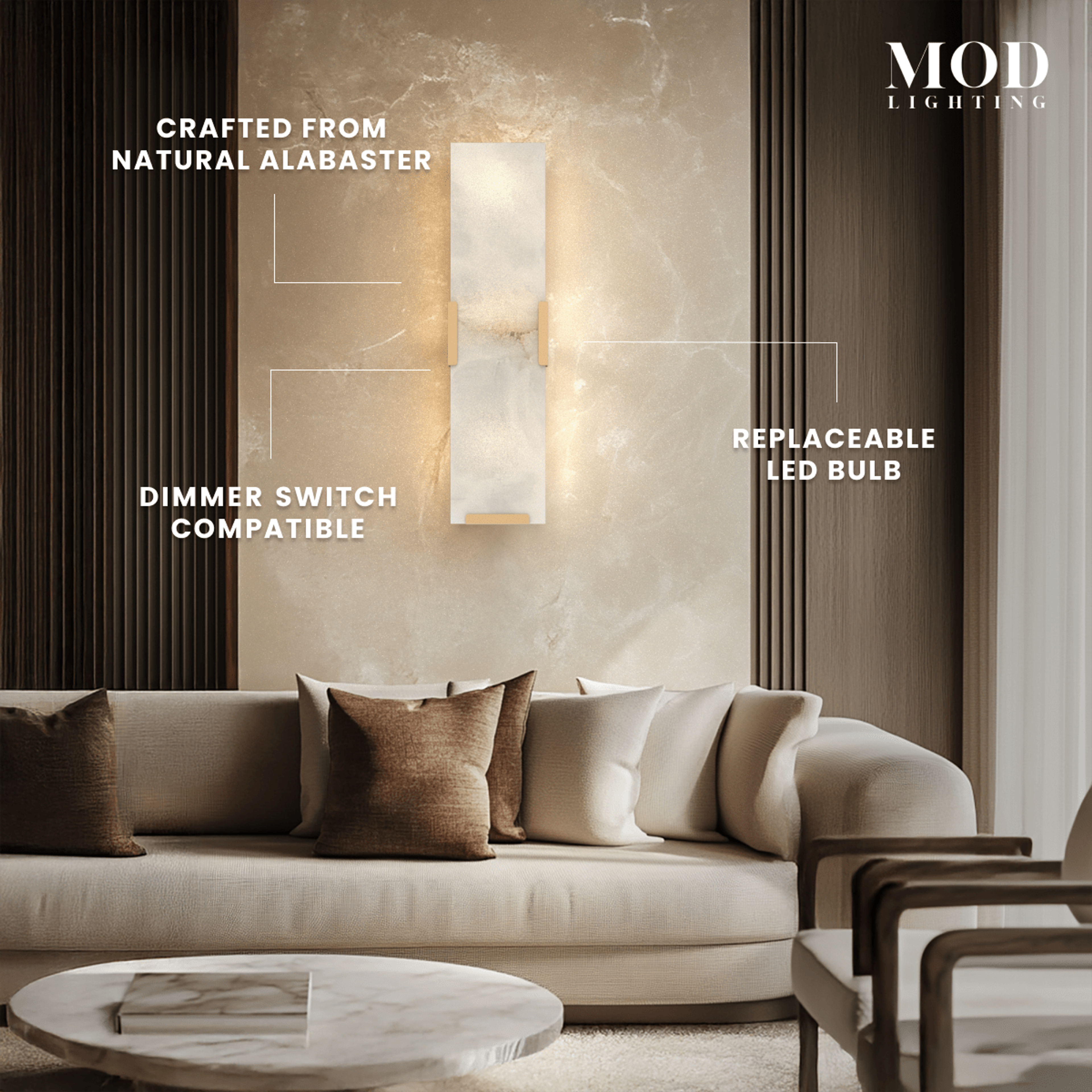 Rhea faceted alabaster wall sconce glowing above a living-room sofa; notes natural alabaster and replaceable LED bulb