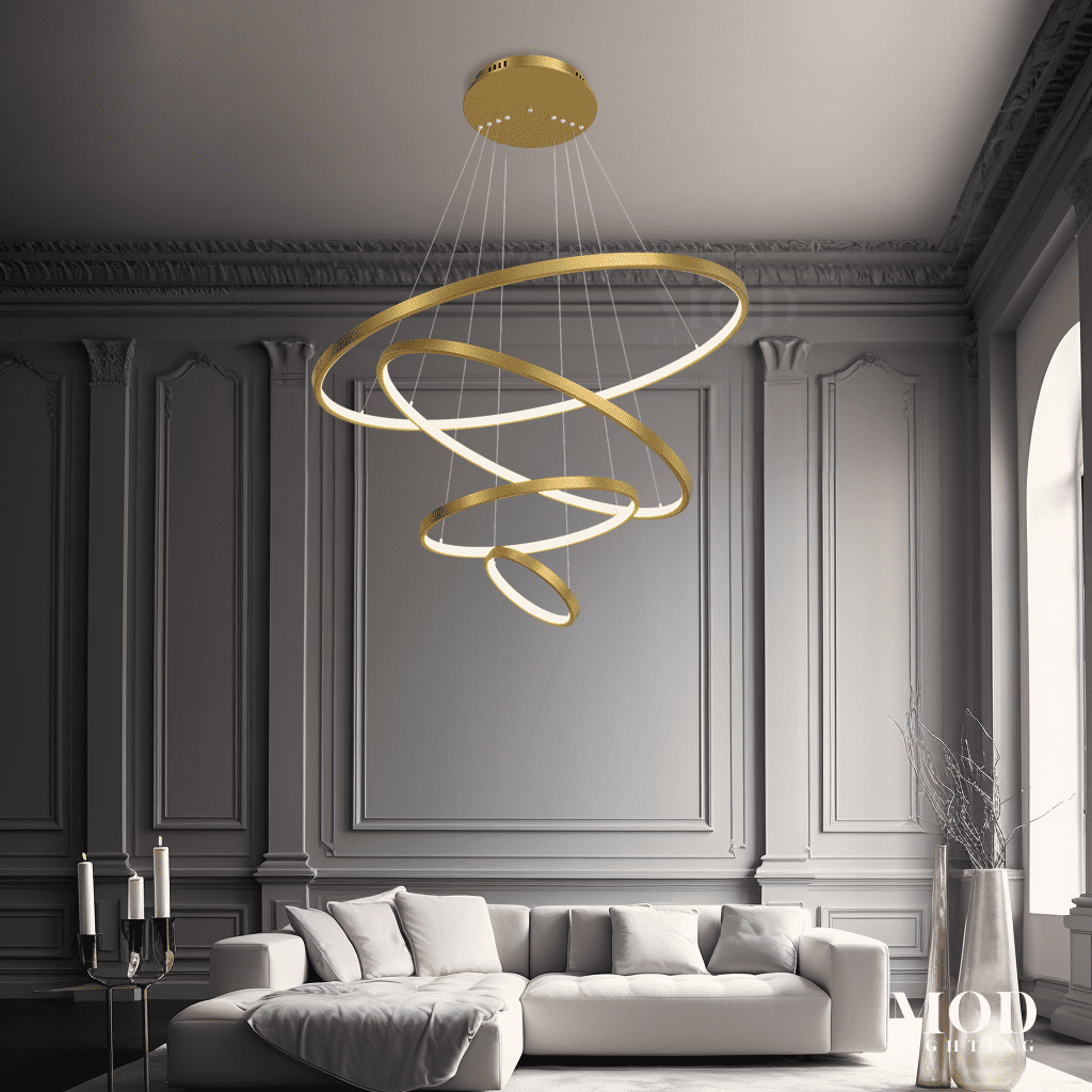 Janet gold spiral ring chandelier with LED bars over a sofa in a paneled gray living room