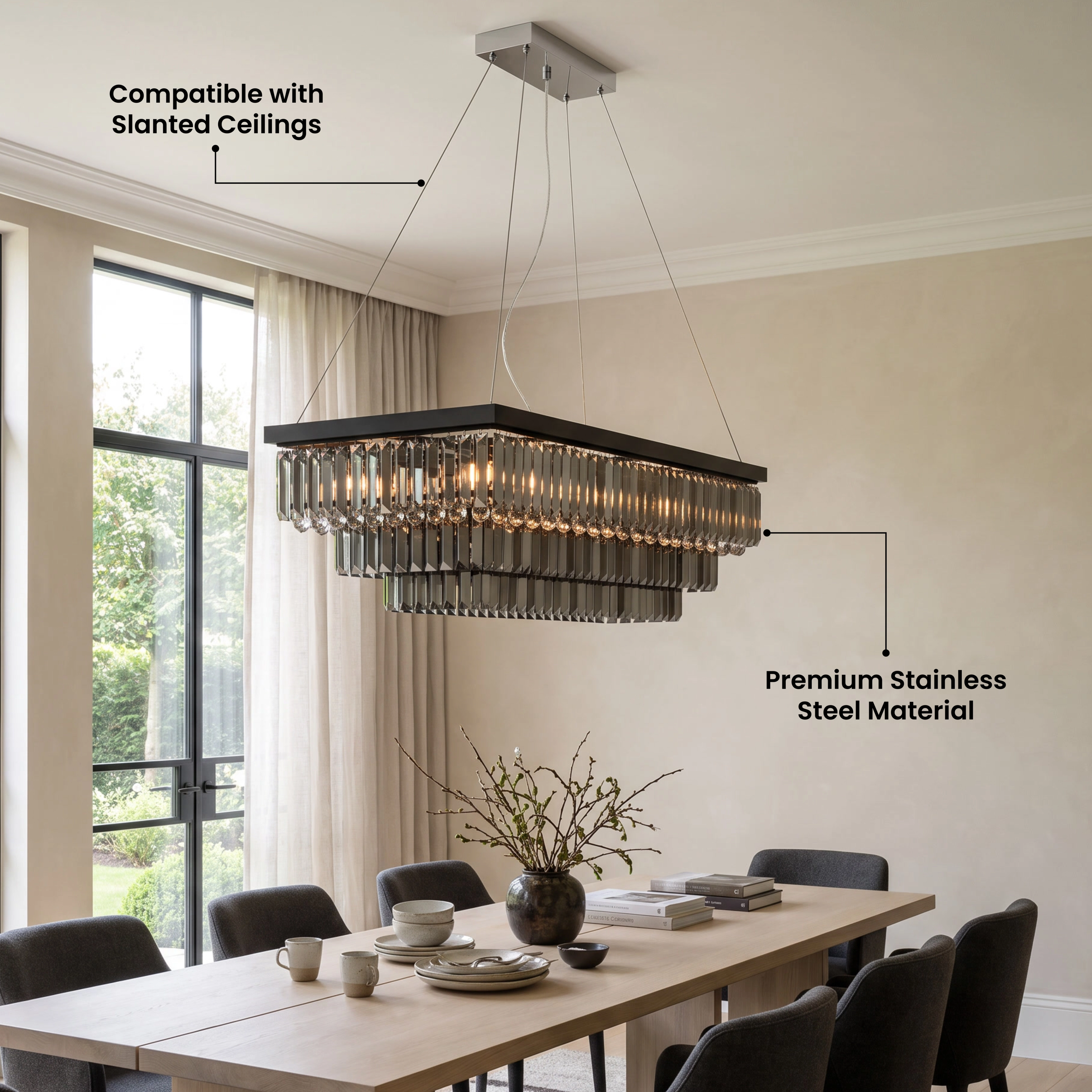 Umbra smoke-grey crystal chandelier over a dining table, five-star customer review overlay