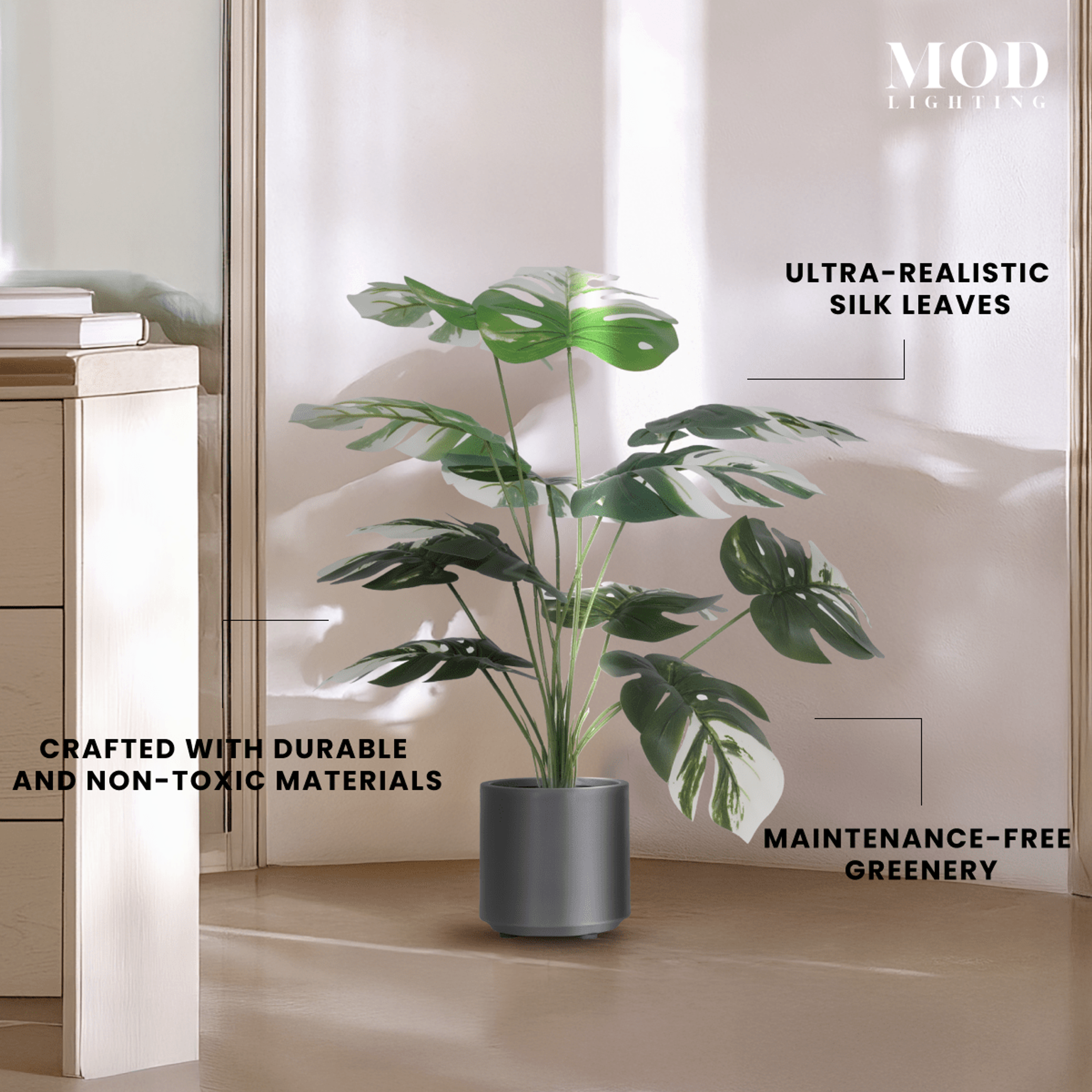Monstera Albo artificial plant, variegated split leaves in a grey pot, with silk-leaf and durable-material callouts