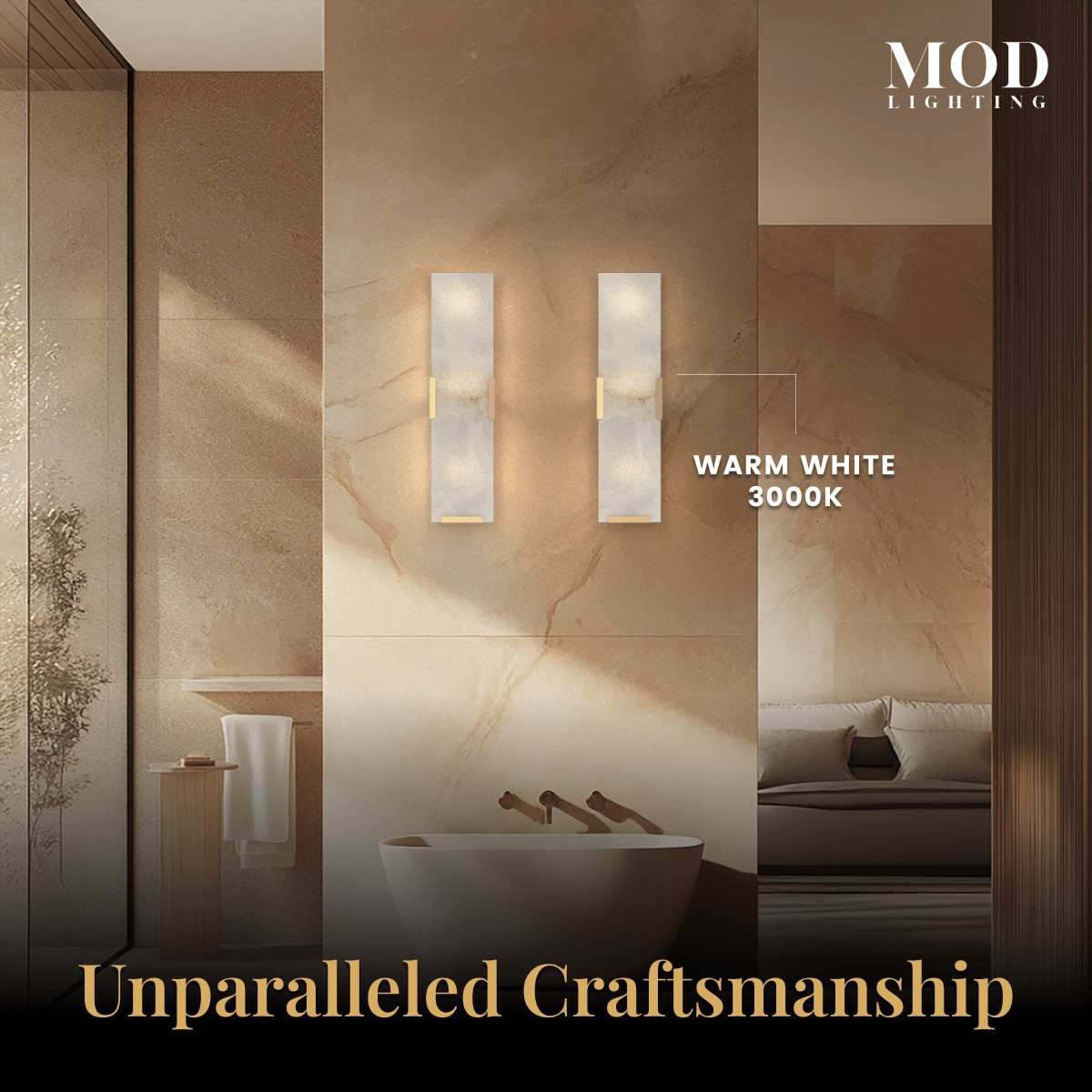 Rhea faceted alabaster wall sconce glowing warm white on a stone bathroom wall
