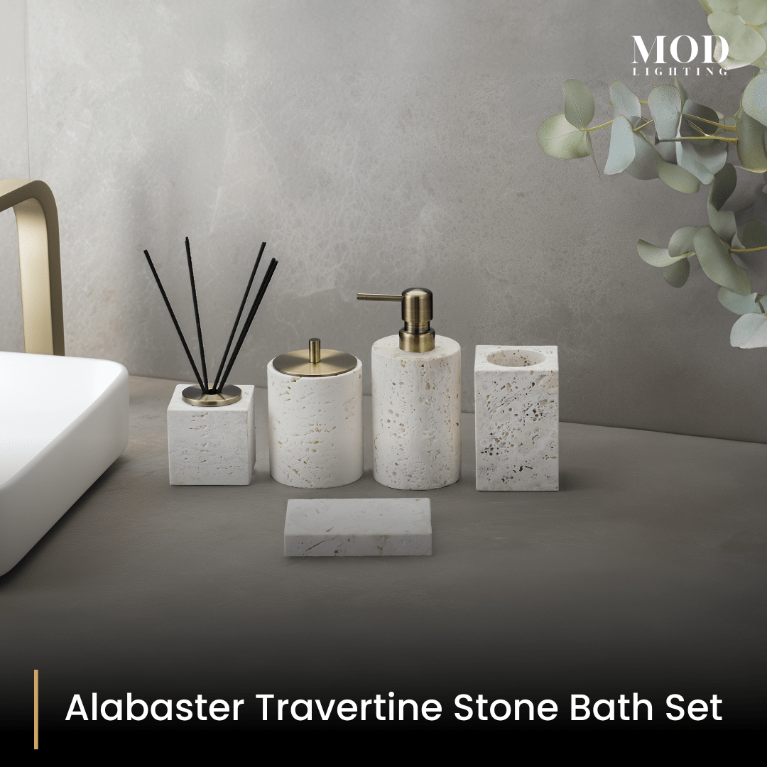 Alabaster Travertine bath set, cream stone pump, jar and diffuser with soap dish on a grey counter