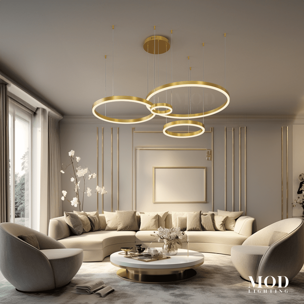 Charlotte chandelier, three concentric gold LED rings suspended over a curved living room sofa