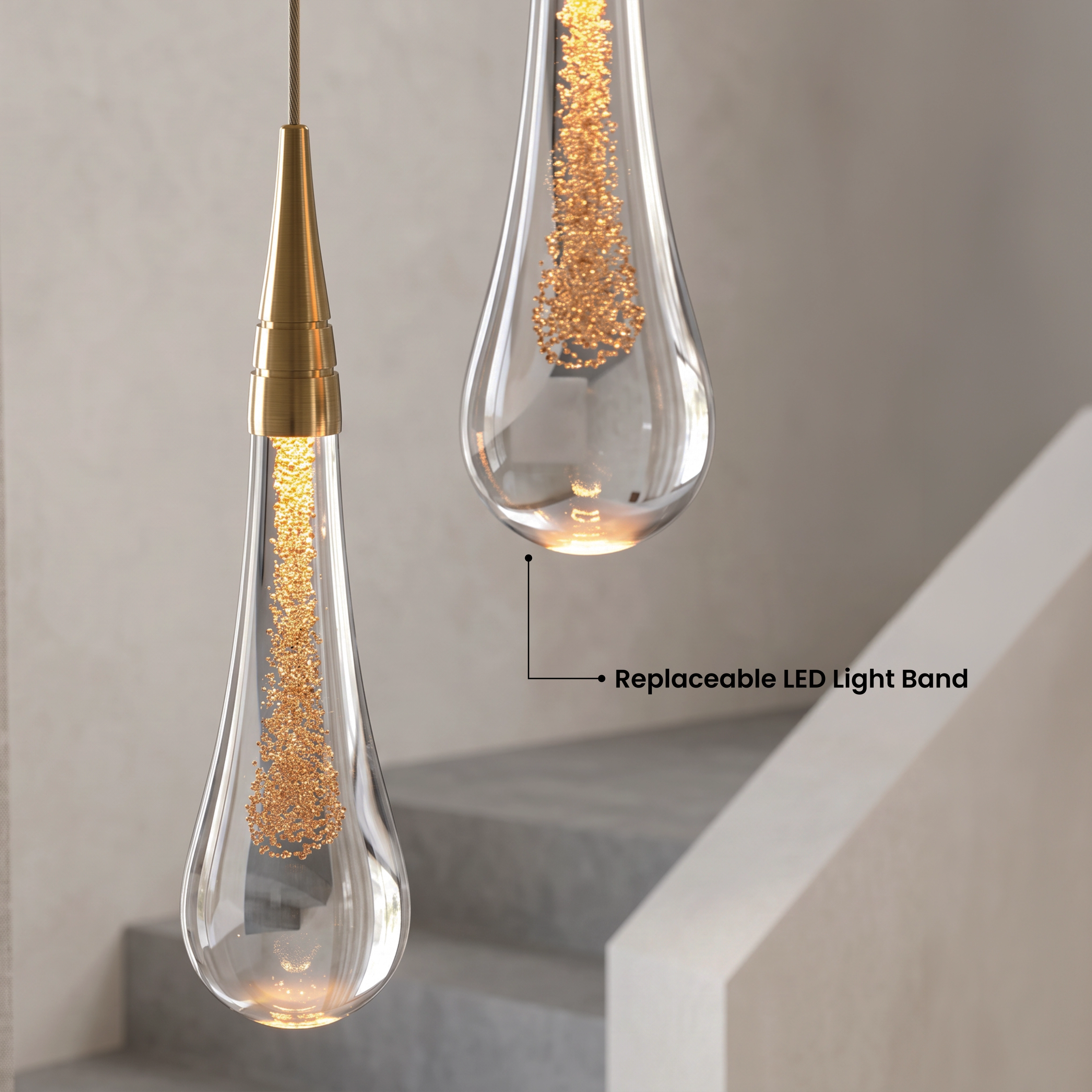 Indra chandelier, warm white 3000K crystal teardrops cascading along a curved staircase wall