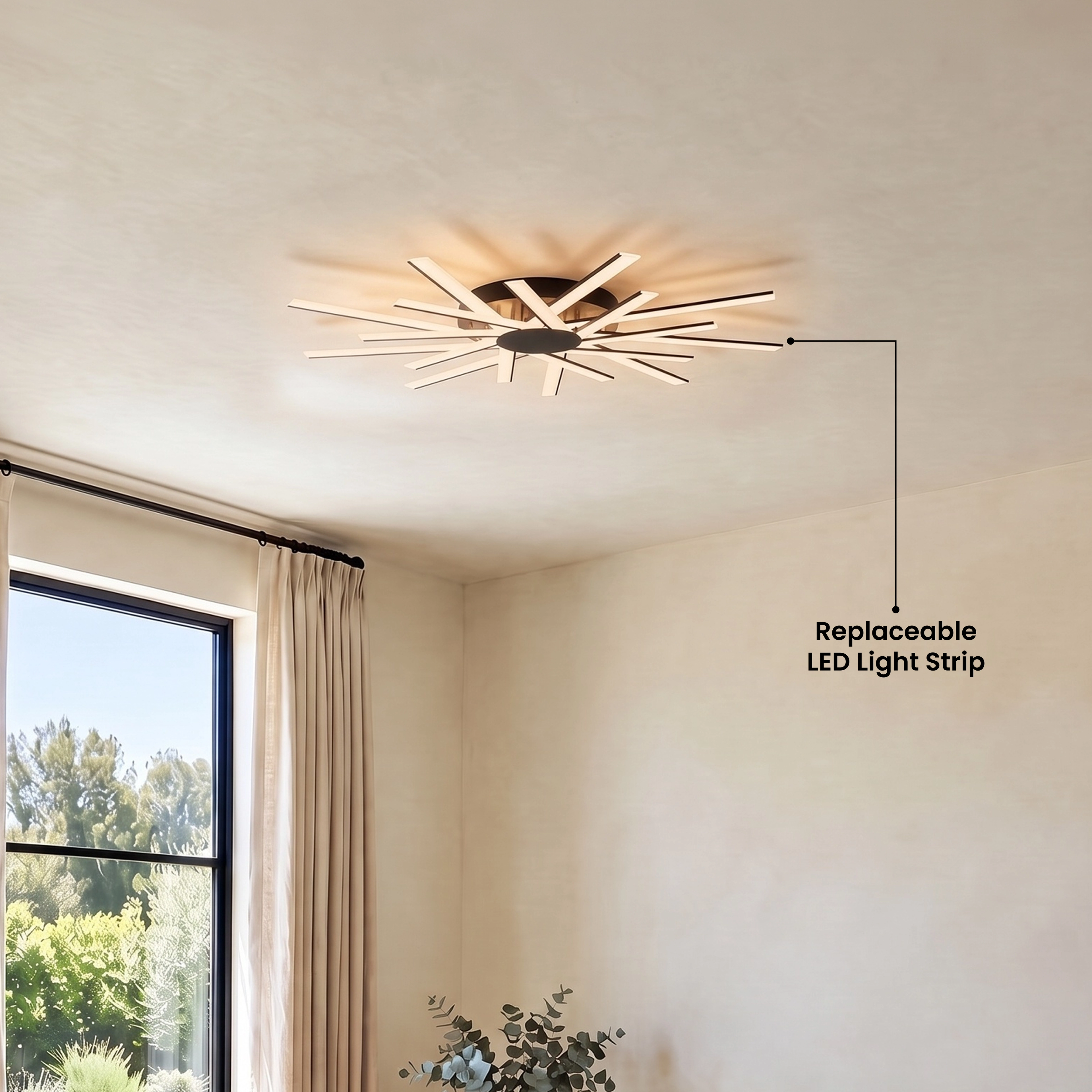 Sparkle ceiling light, gold sunburst LED fixture on ceiling above a dining nook