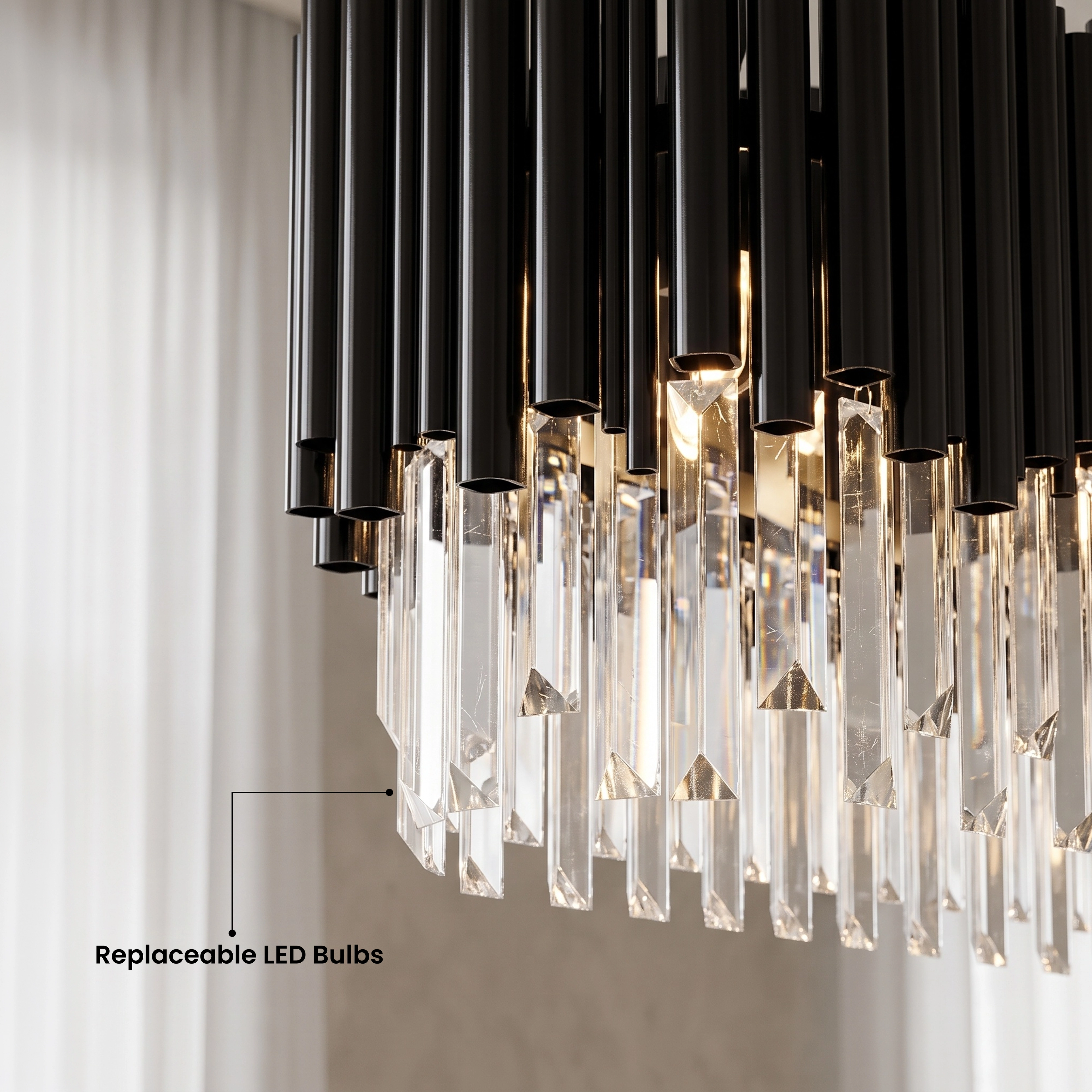 Obsidian Pendant black linear crystal chandelier in warm white 3000K over a dining table