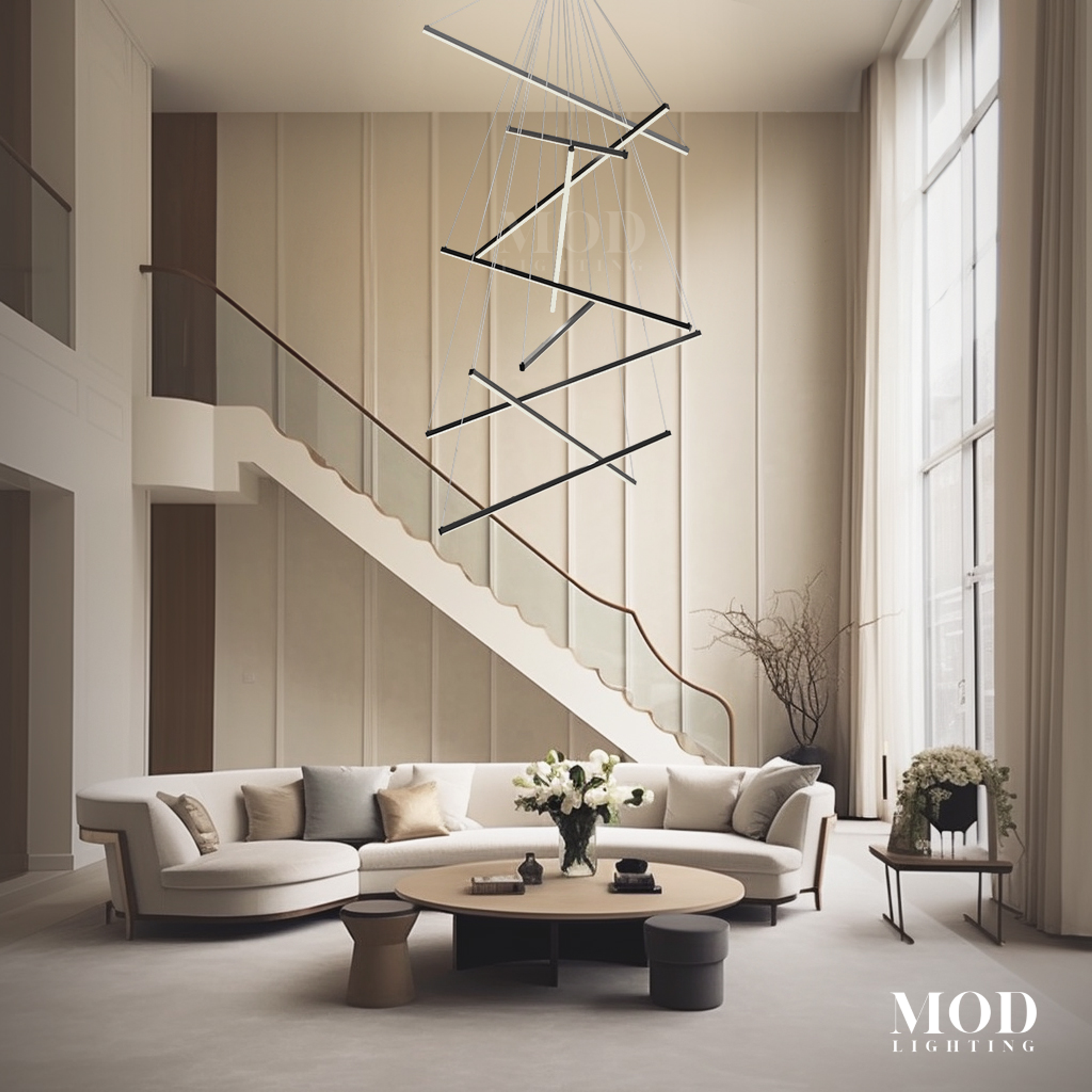 Finn, angular black linear cascade of suspended lights over a sofa beside a staircase