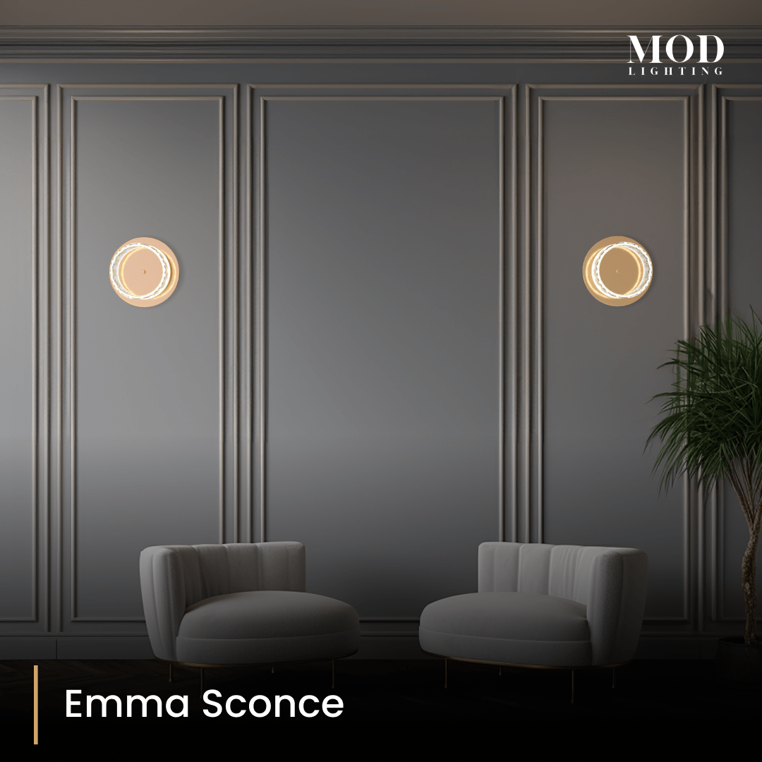 Emma round crystal-ring sconces flanking a gray paneled wall above two accent chairs