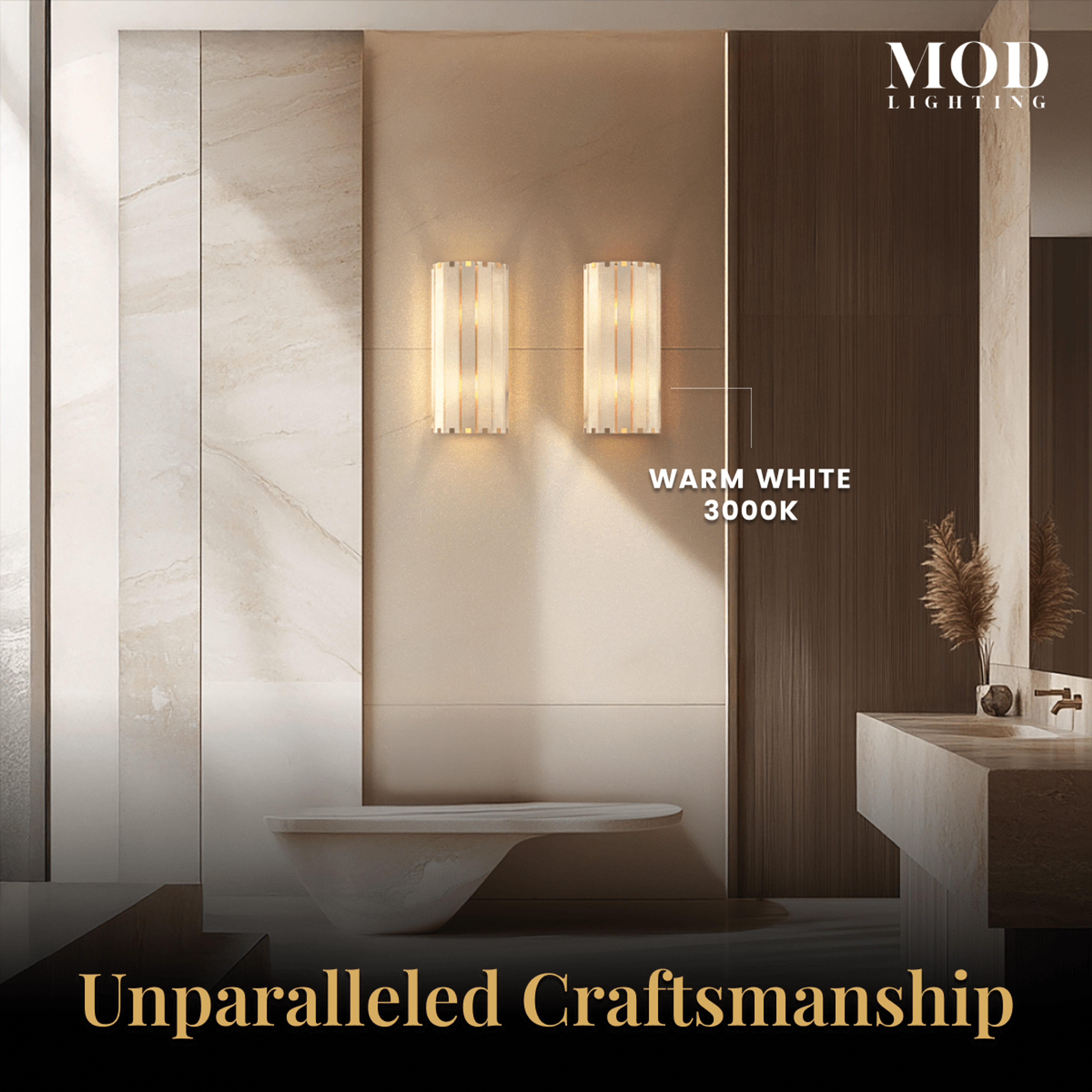Nala alabaster wall sconce lit warm white 3000K on a wall above a freestanding tub in a bathroom