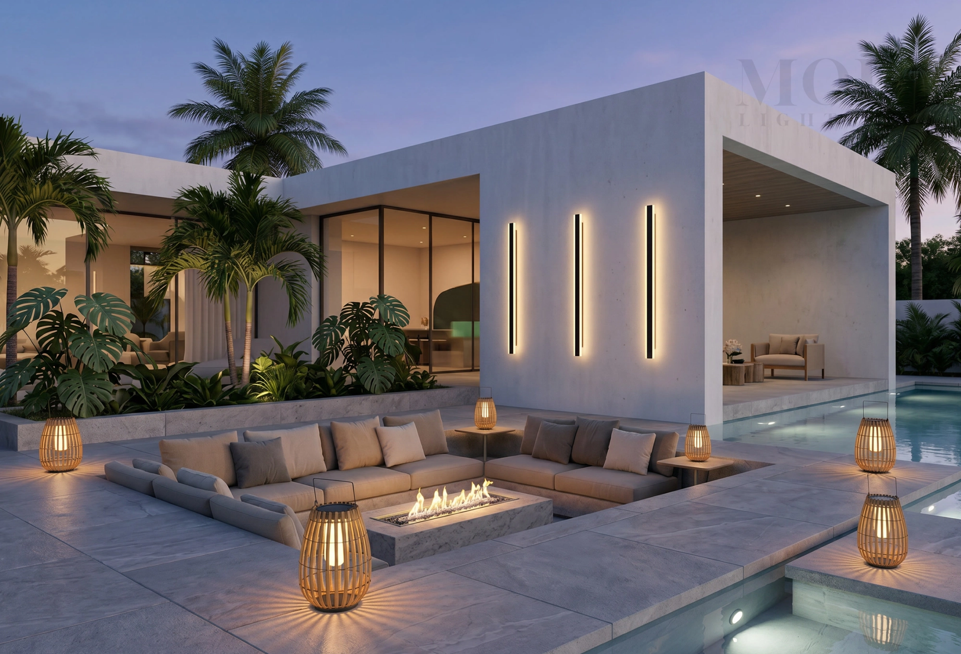 Luxury outdoor entertaining area at night with layered warm lighting