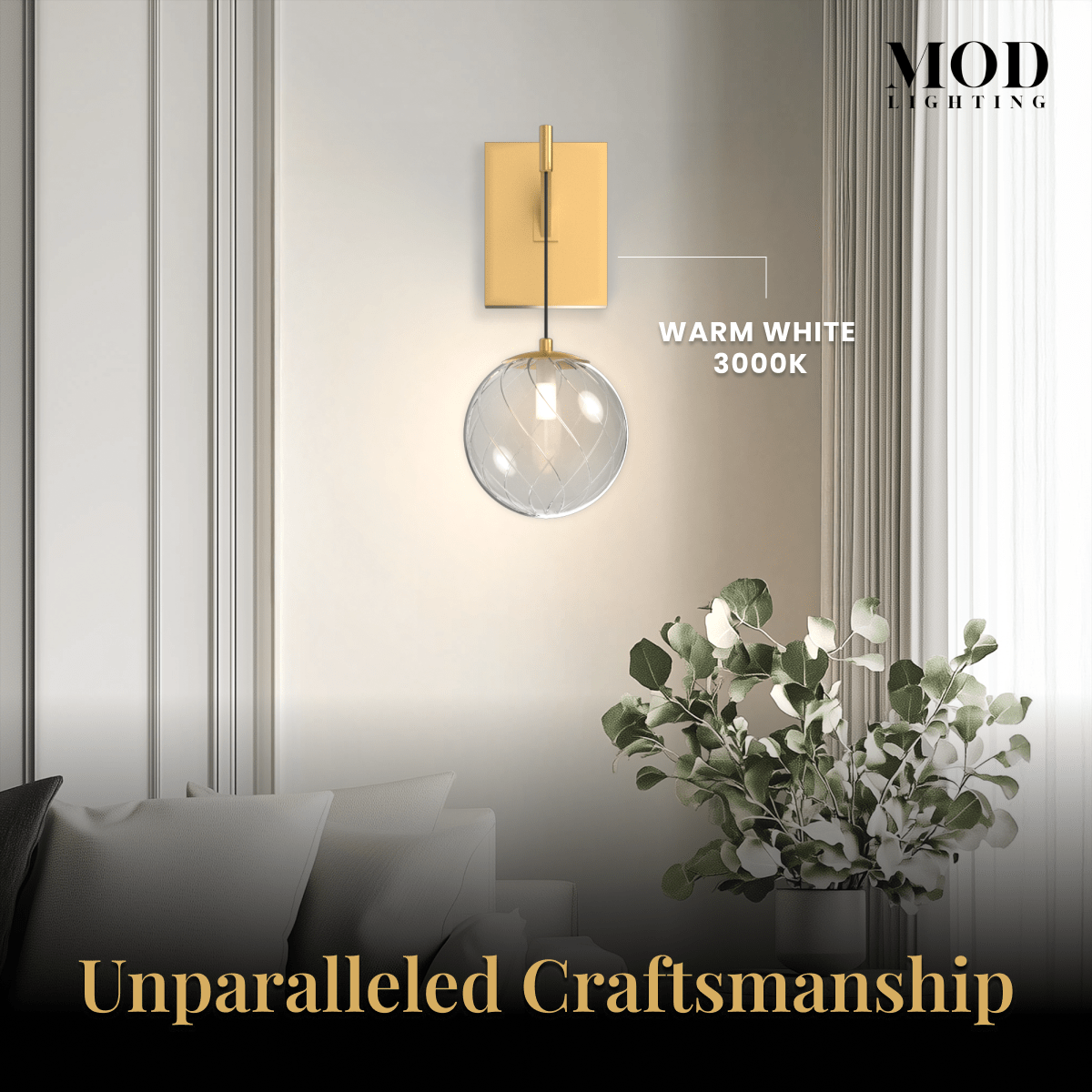 Mirella Sconce, brushed-gold globe wall light in warm white 3000K, on a pale plaster wall above florals