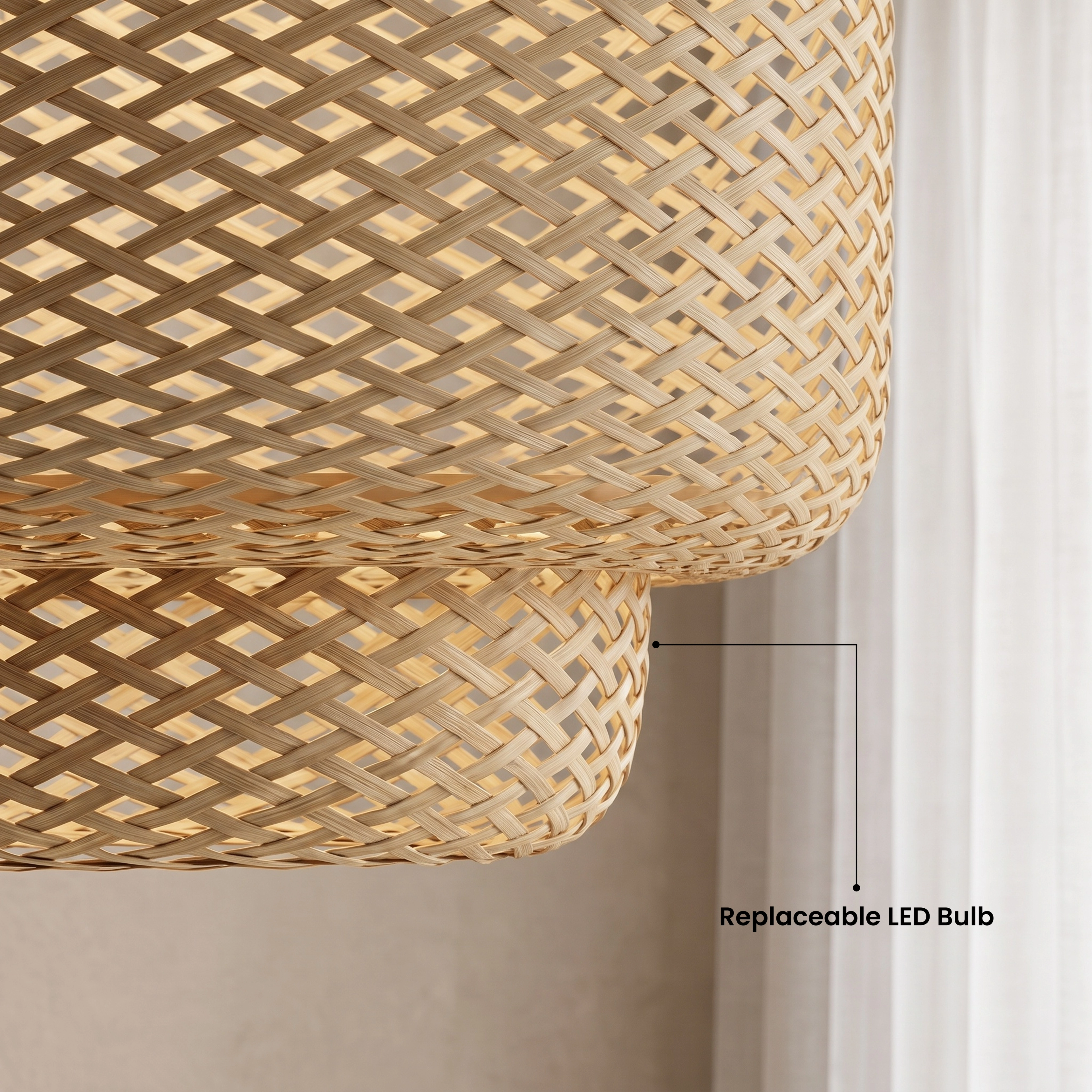 Elva bamboo lantern pendant, tiered woven barrel form, over a dining table in warm white, 3000K