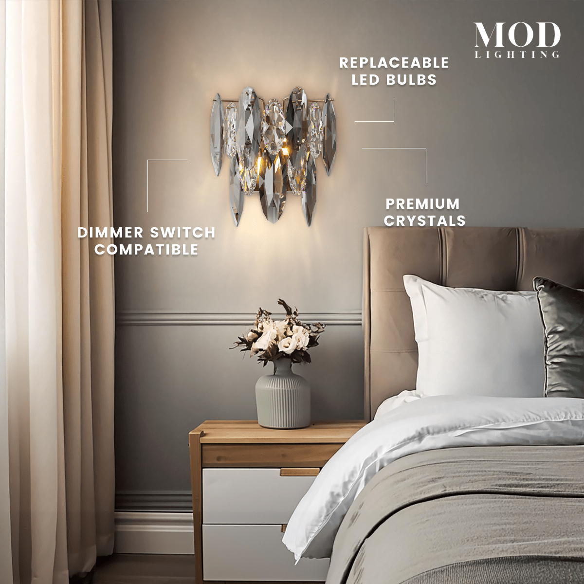 Celestial gold and smoke-crystal wall sconce beside a bed, labeling LED, dimmer and premium crystal features
