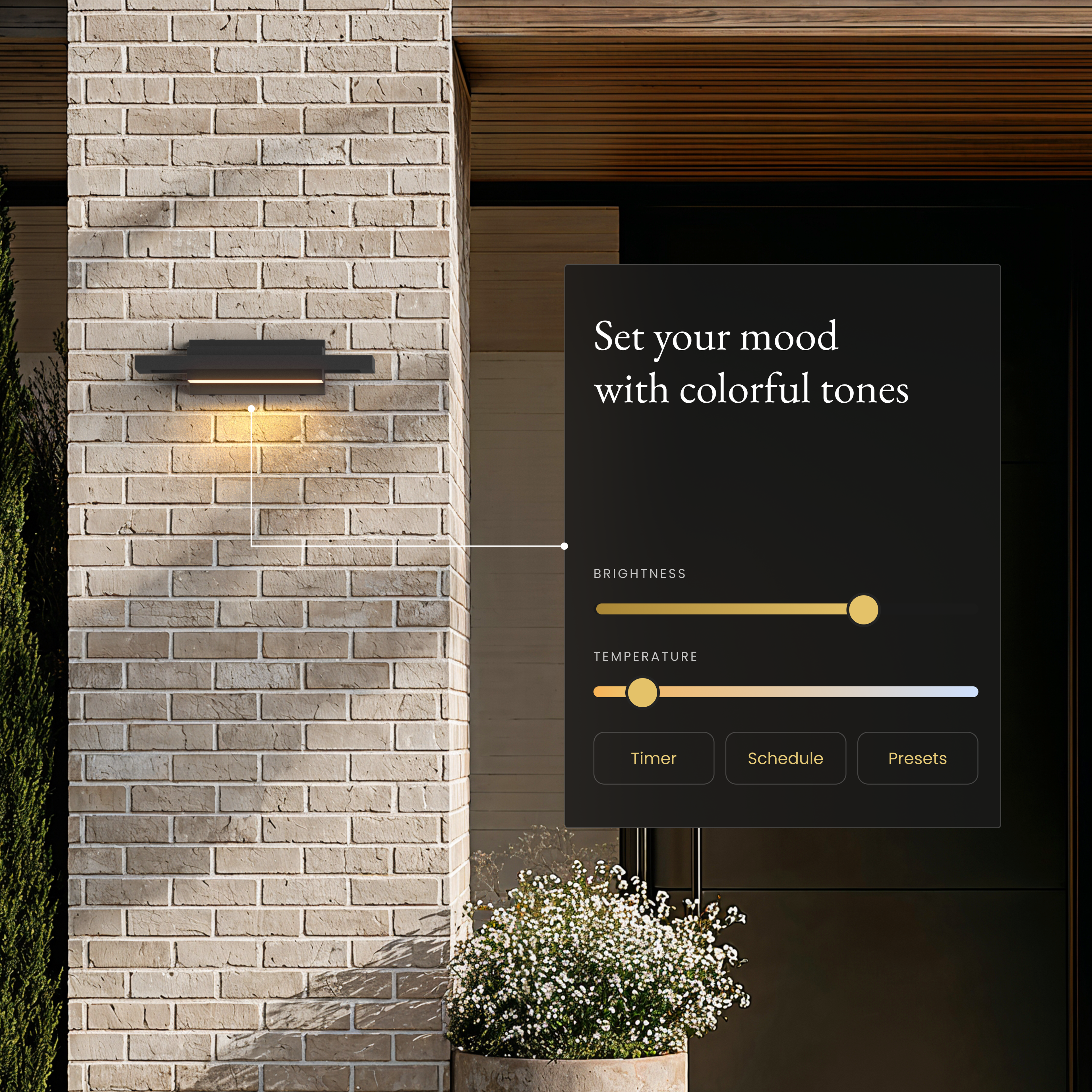 Brooklyn Smart black stainless sconce on a brick pillar beside an app panel for brightness and color temperature