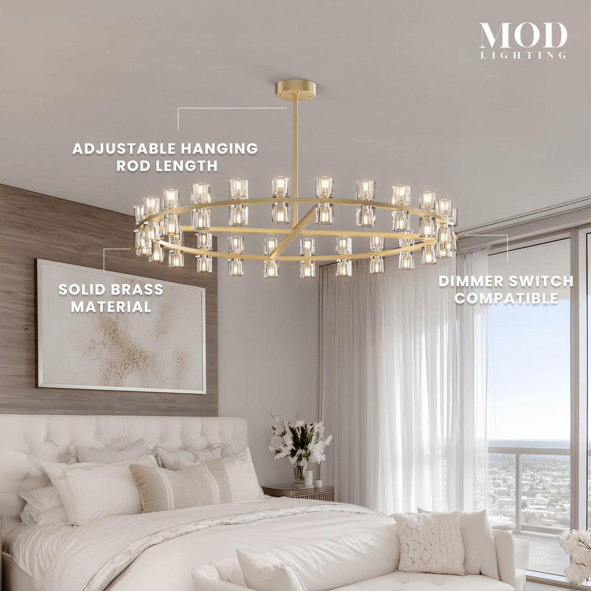 Sunrise brushed-gold ring chandelier with cube-cut crystal shades over a bed, noting adjustable rod and solid brass
