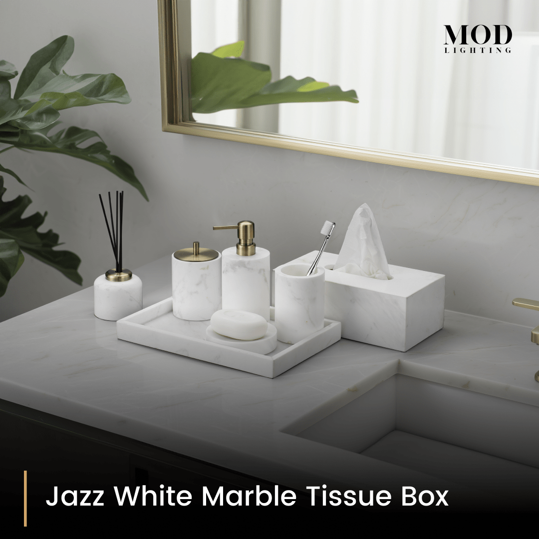 Jazz White Marble tissue box and bath set styled on a grey stone vanity with a plant and mirror