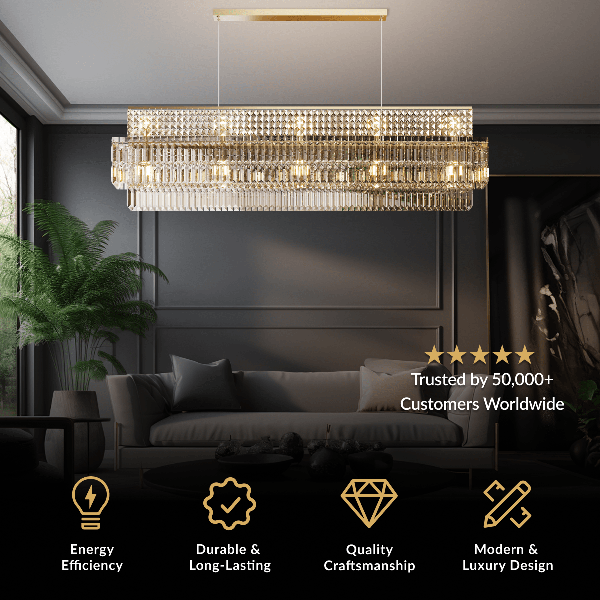 Krystal rectangular chandelier, gold frame with cascading clear crystal strands, over a sofa in a dark room